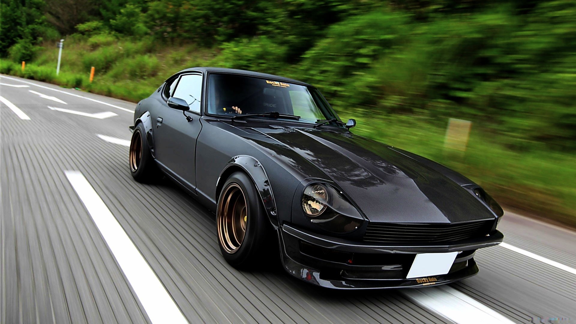 Matte Black Nissan Fairlady Z on a Winding Road HD Wallpaper