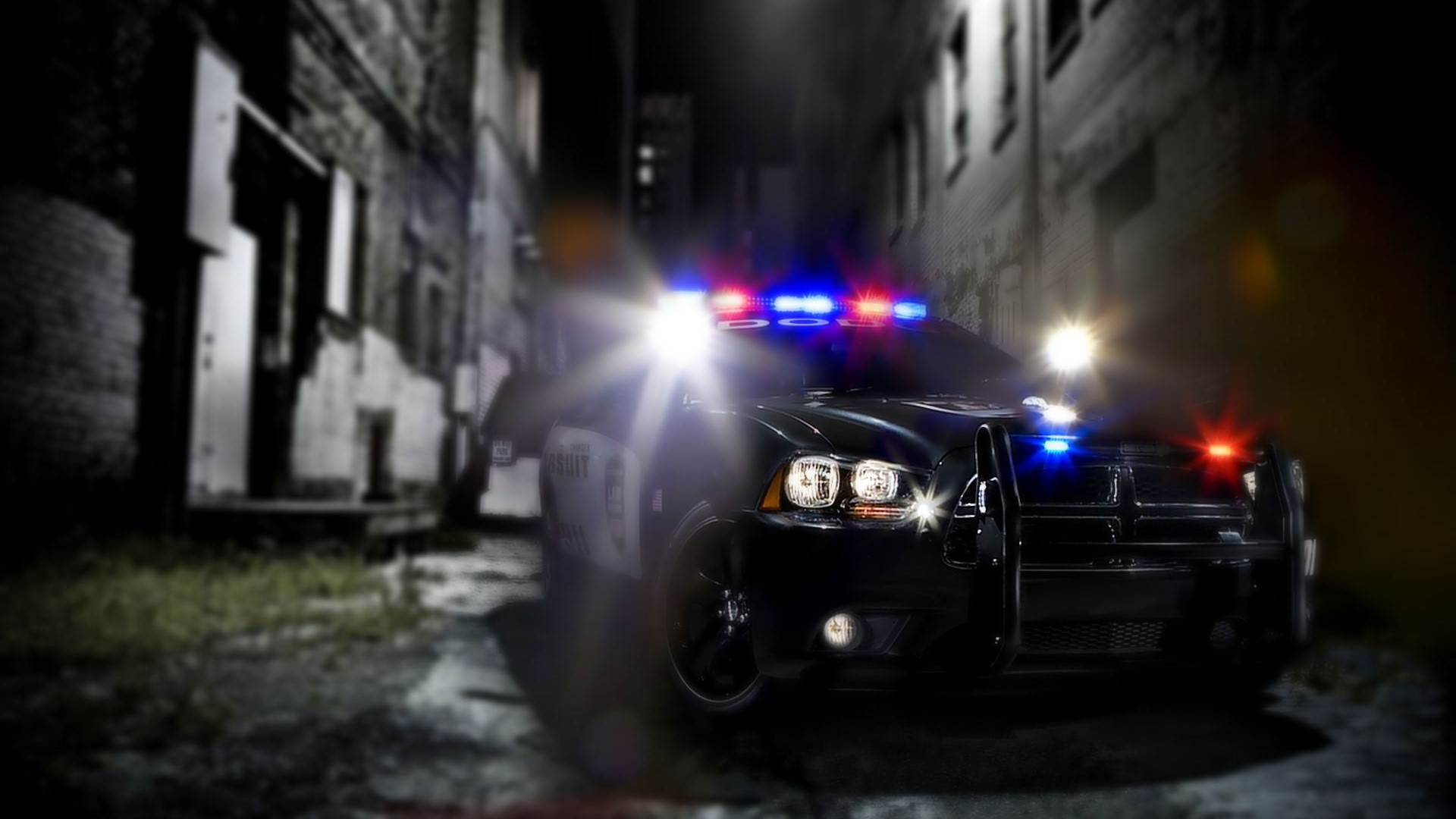 Police car with flashing lights in alley at night HD Wallpaper