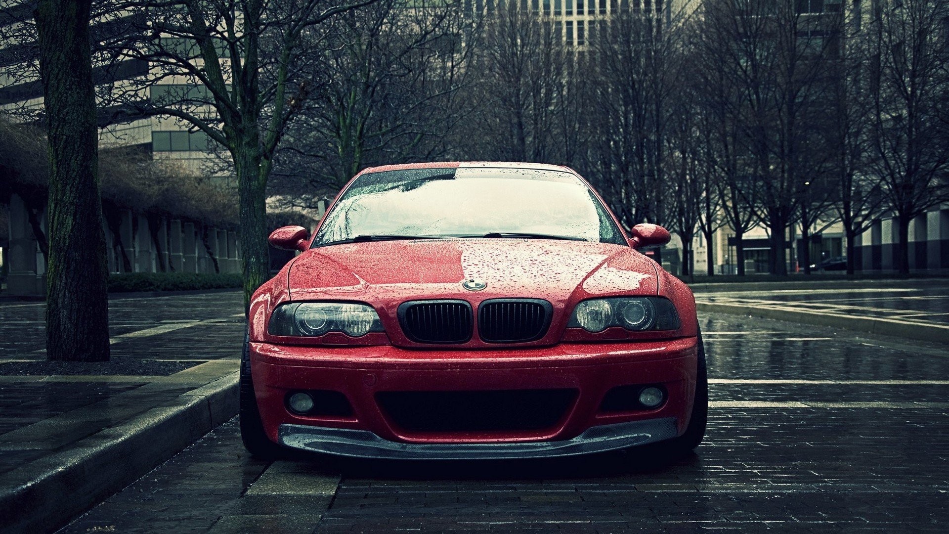 Red BMW E46 M3 parked on a wet street HD Wallpaper