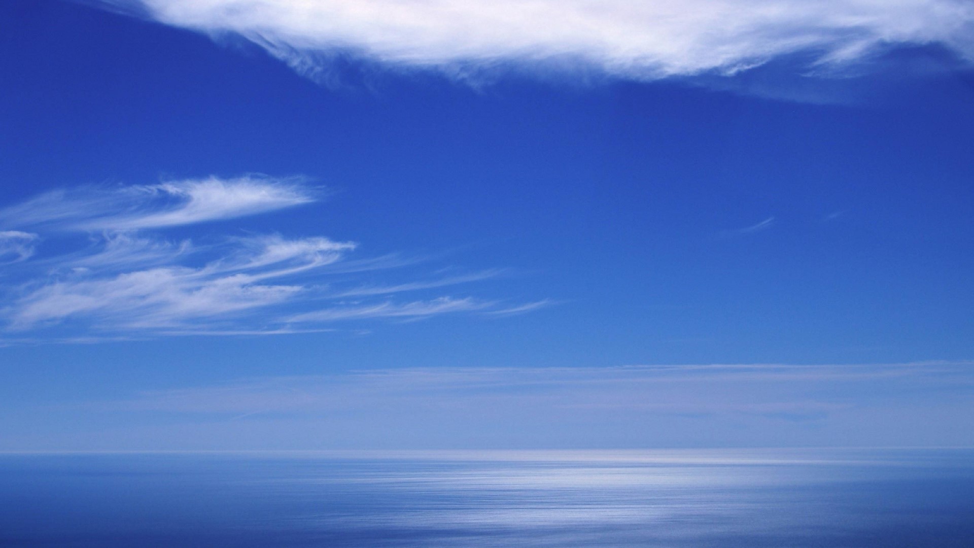 Blue Sky and Ocean with Wispy Clouds HD Wallpaper