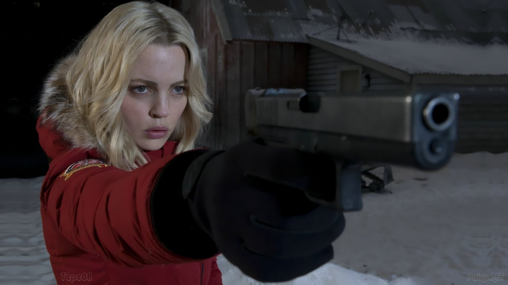 Woman with gun in snow HD Wallpaper