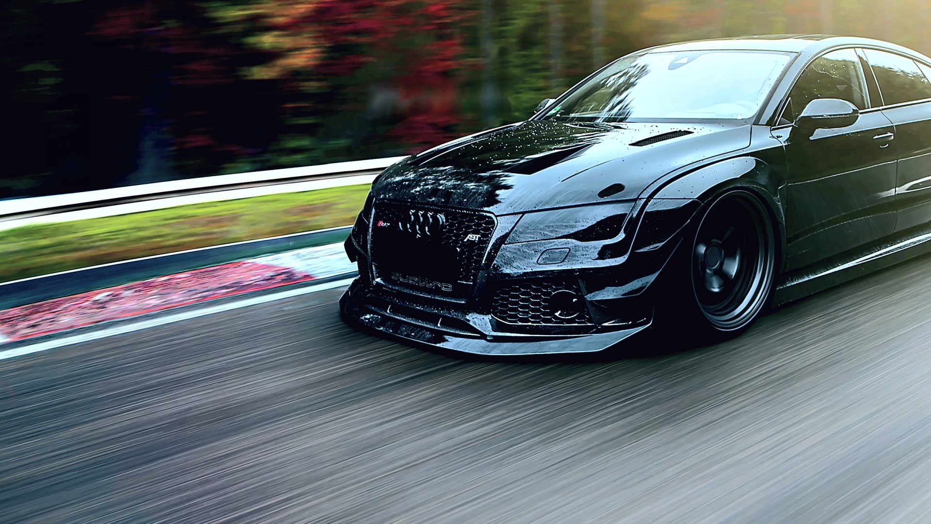 Black Audi RS7 on a Racetrack HD Wallpaper