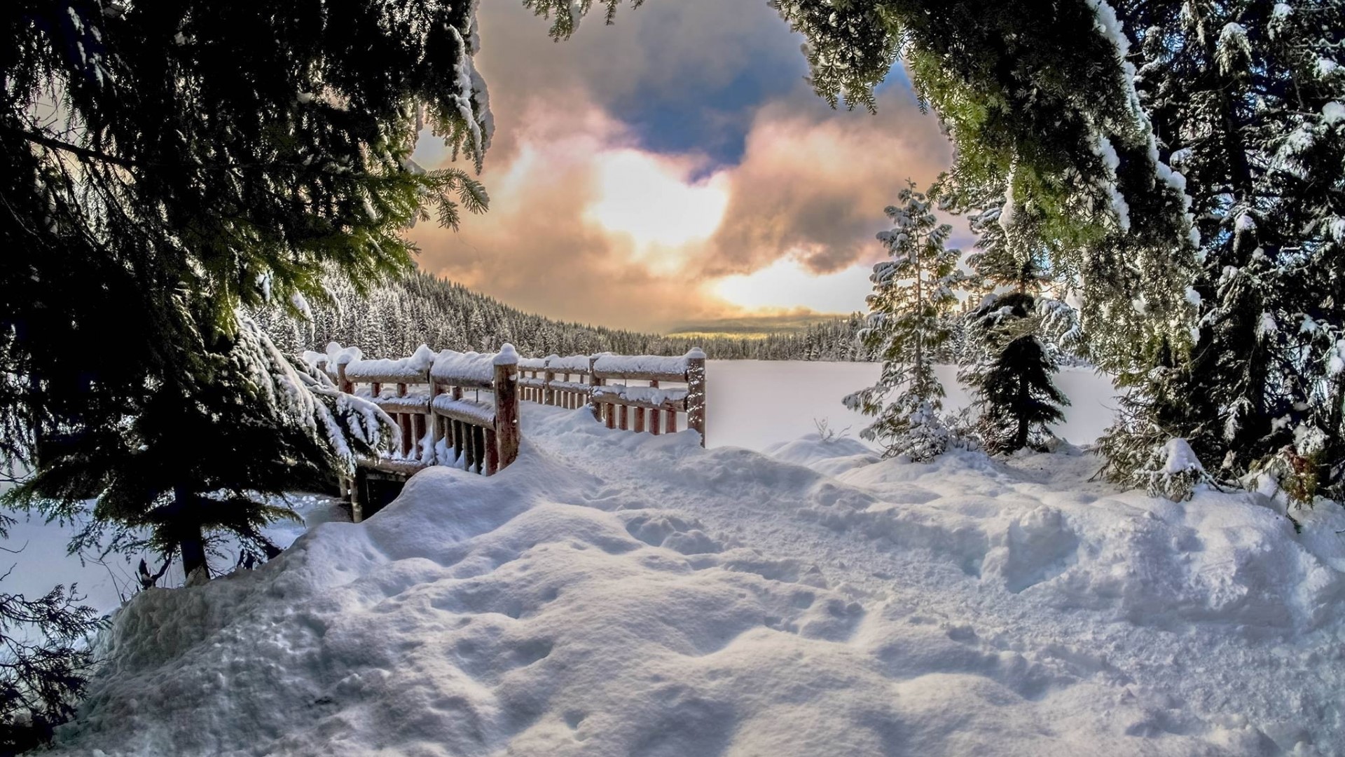 Winter scene with snow-covered wooden pier and frozen lake HD Wallpaper