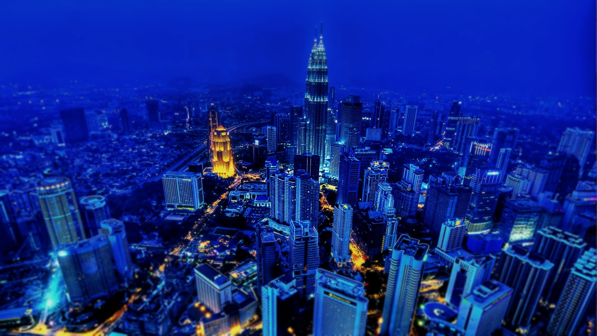 Cityscape at Night with Tall Buildings HD Wallpaper