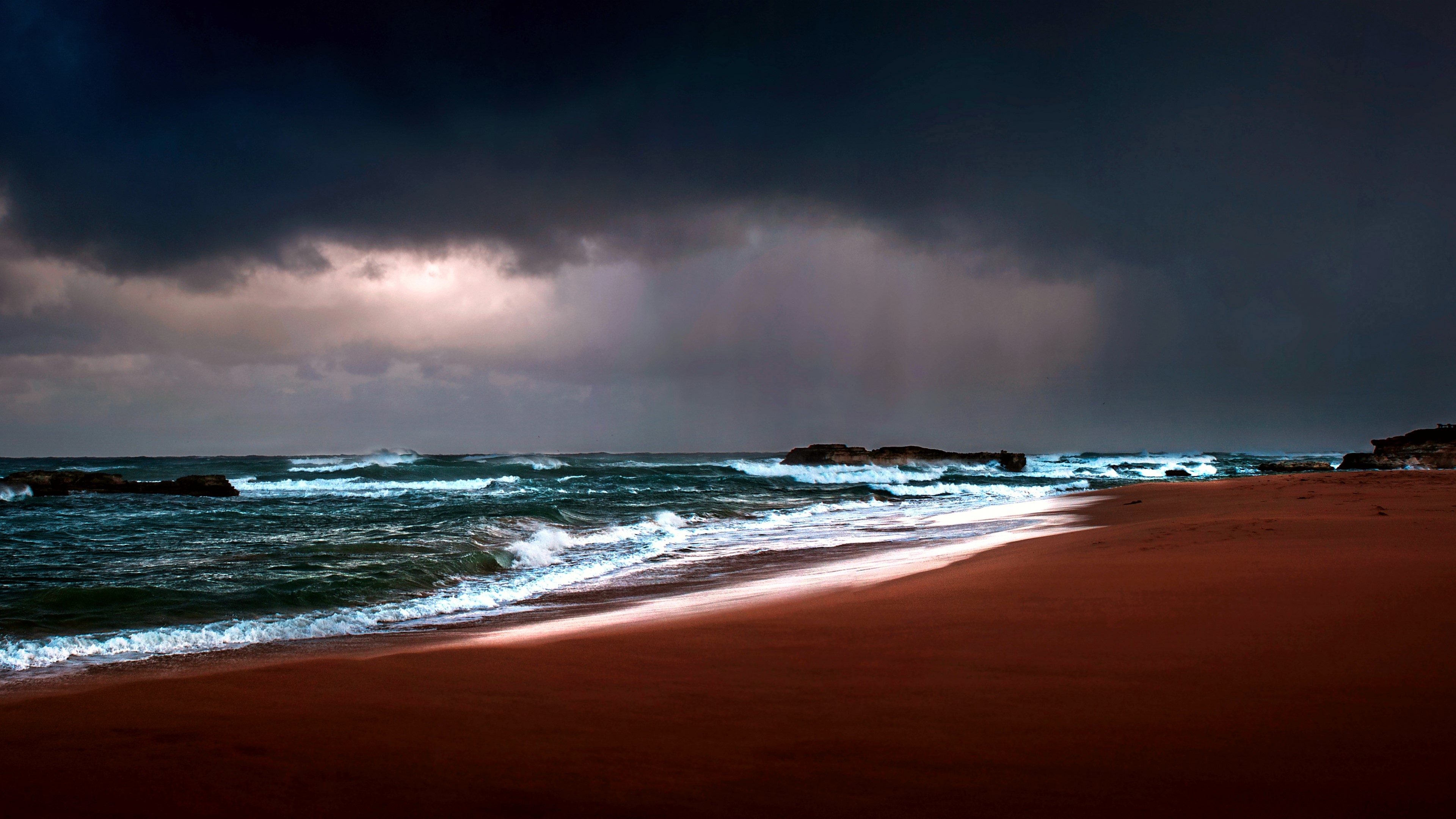 4K Ocean Waves Crashing on Beach Under Stormy Sky HD Wallpaper