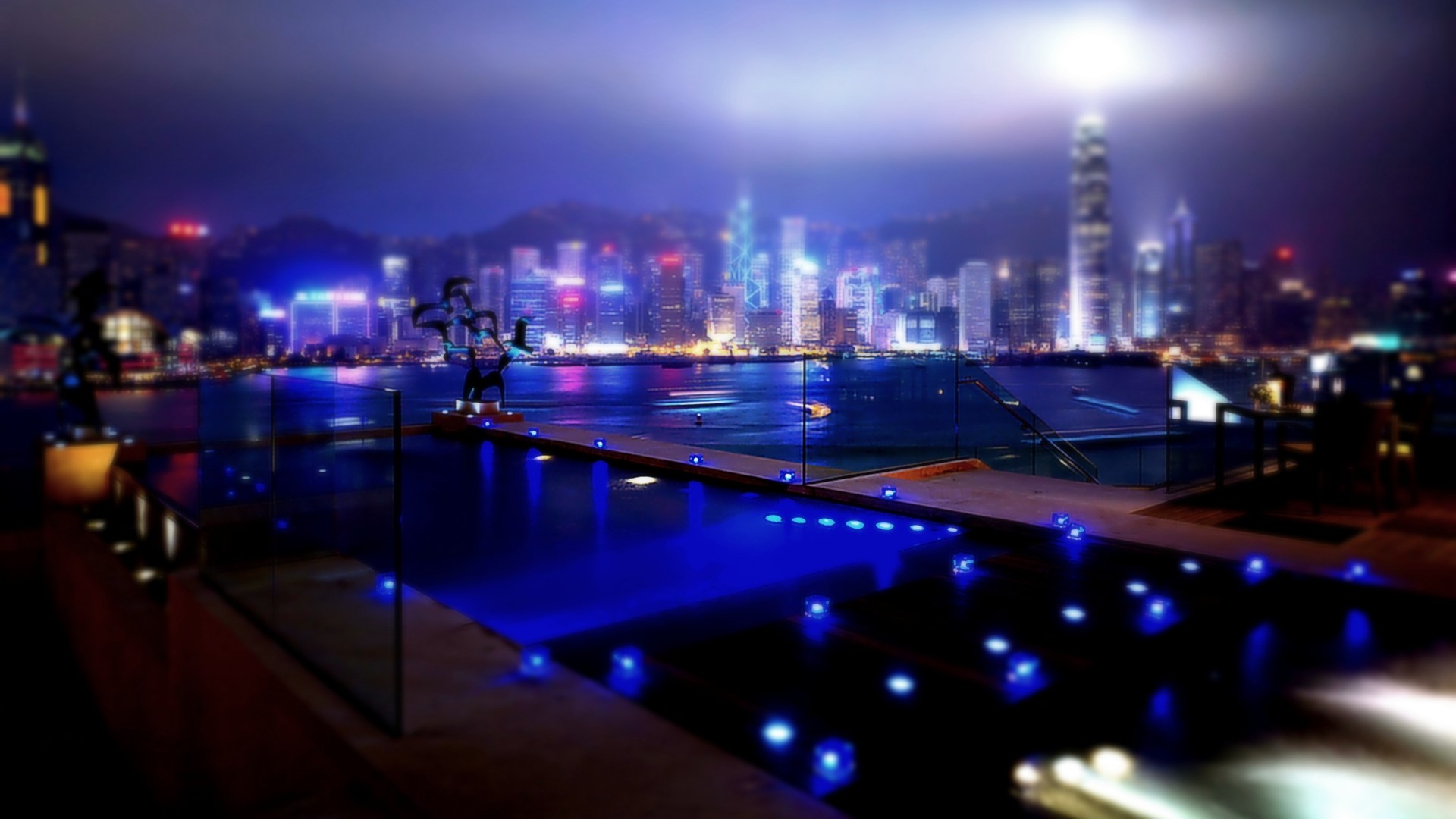 Hong Kong skyline at night with waterfront HD Wallpaper