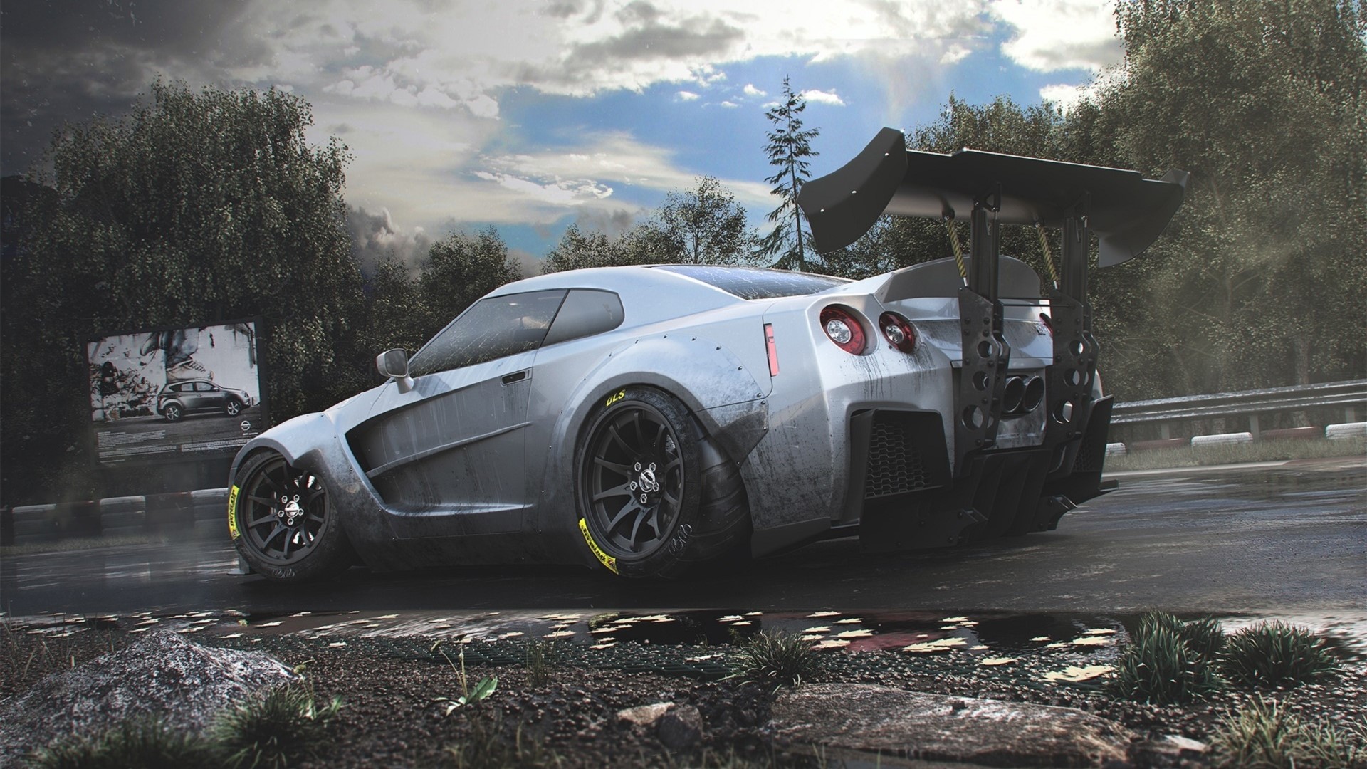 Nissan GT R with a large rear spoiler HD Wallpaper