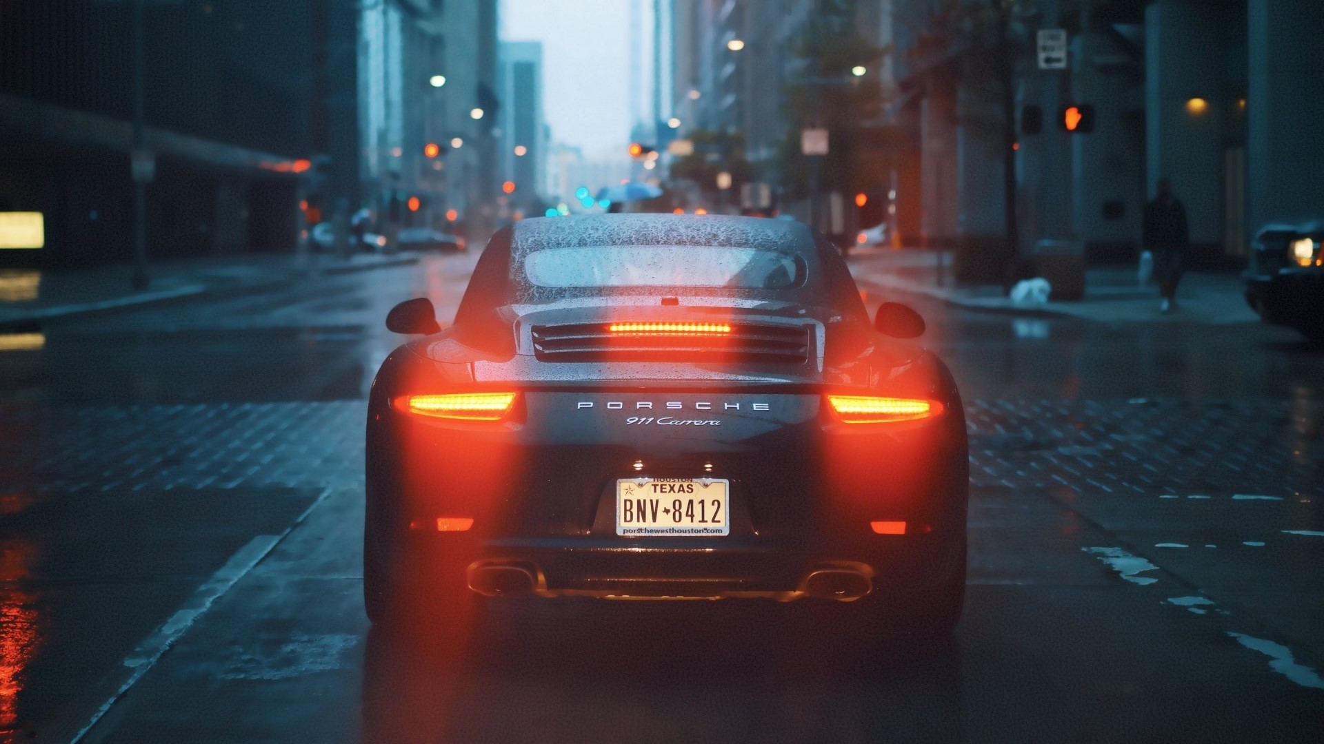 Porsche 911 Carrera on a Rainy City Street HD Wallpaper
