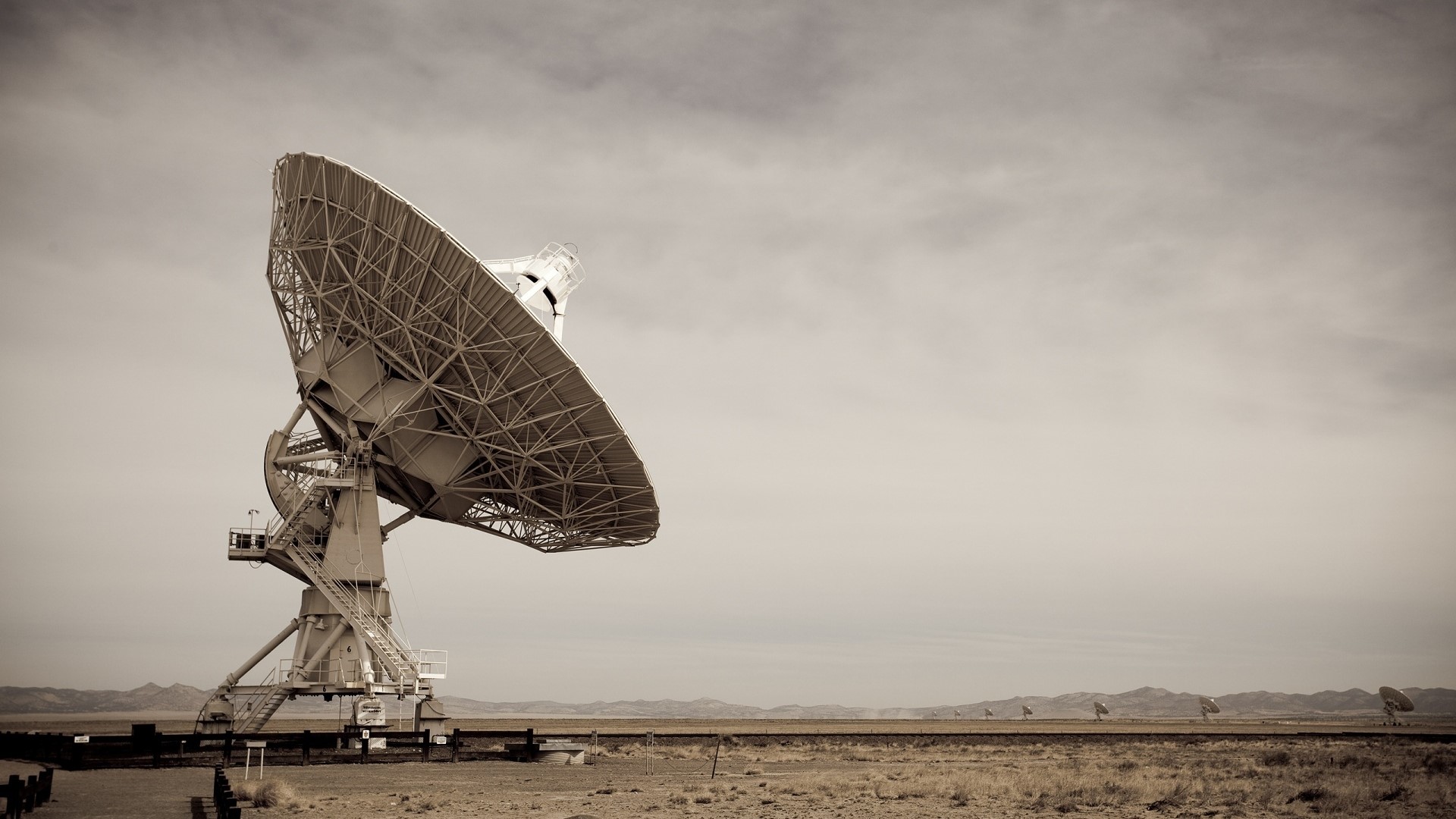 Very Large Array radio telescopes in a desert landscape HD Wallpaper
