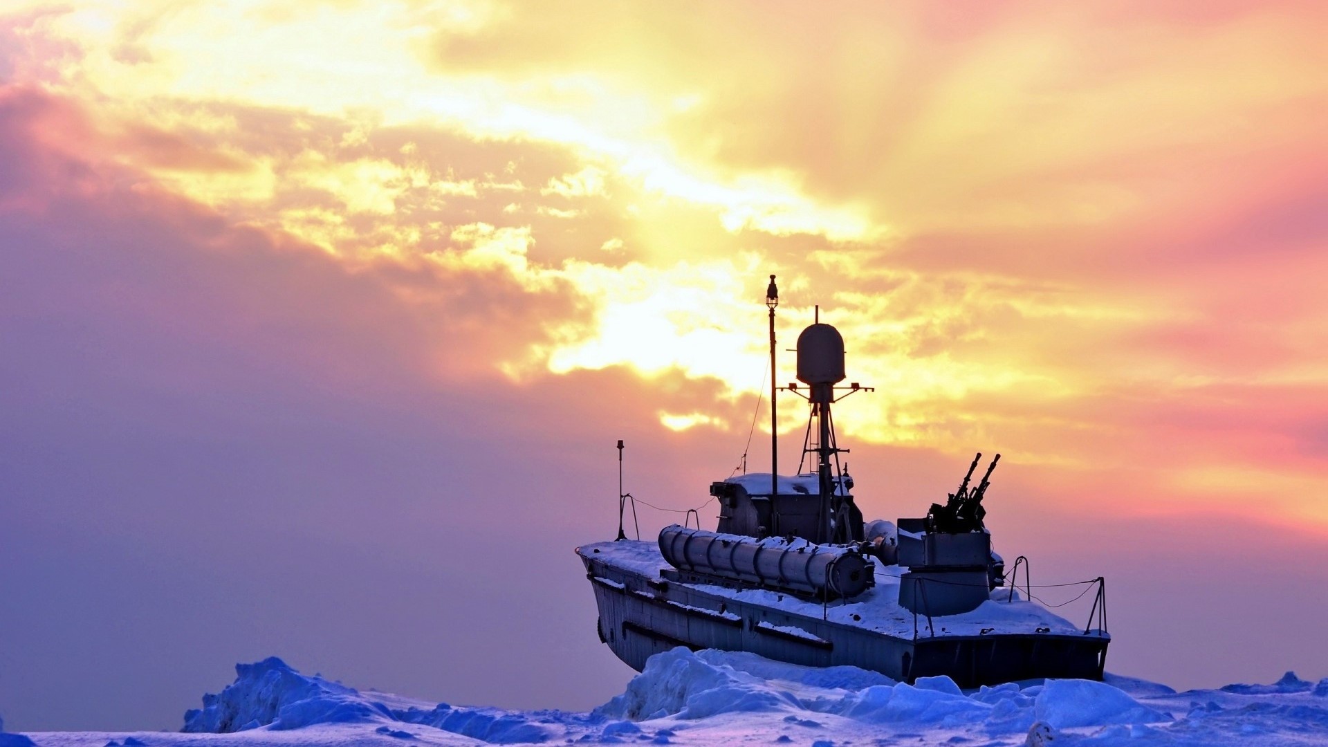 Ship in a frozen sea at sunset HD Wallpaper
