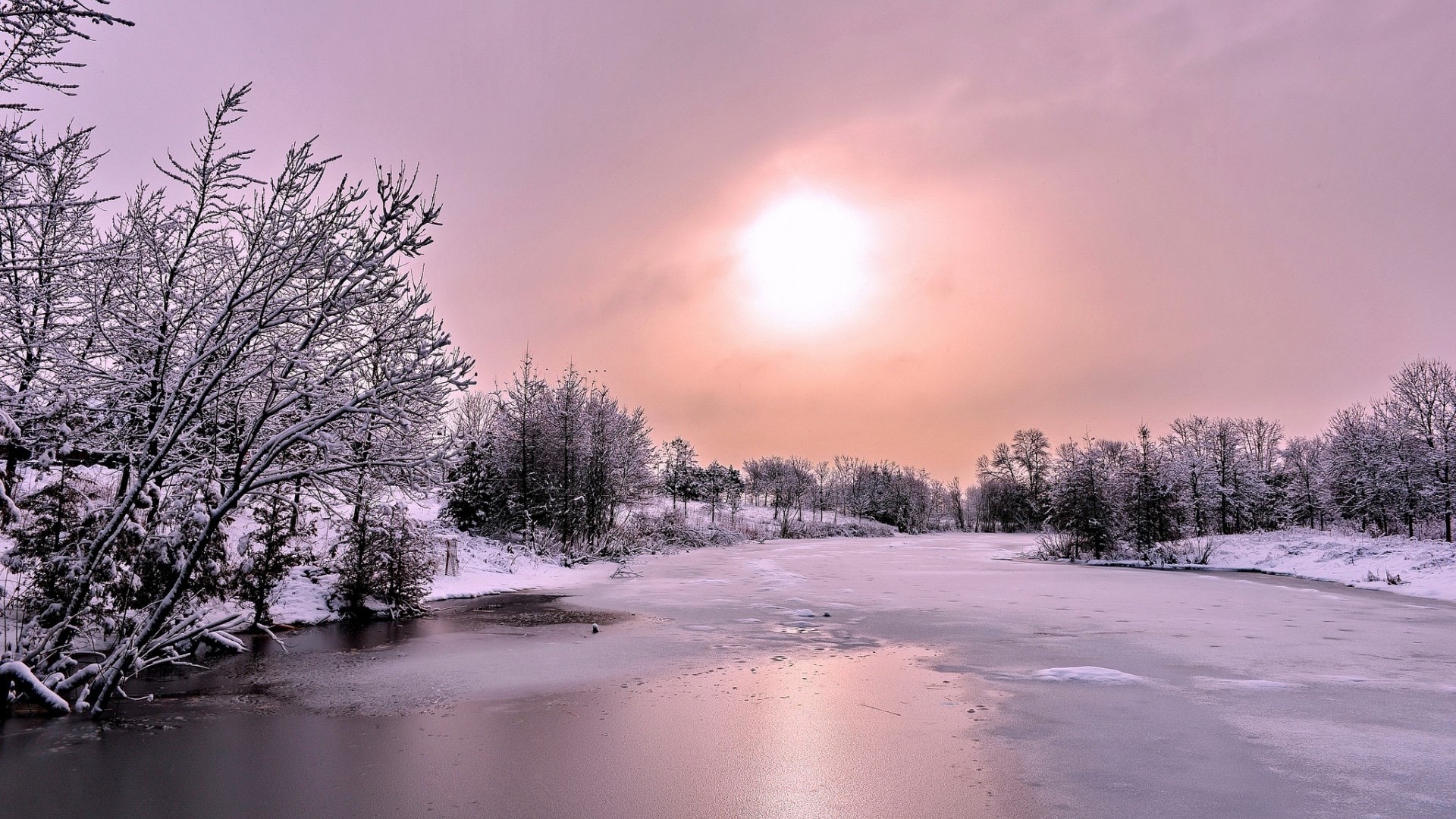 Snowy landscape with frozen river and trees HD Wallpaper