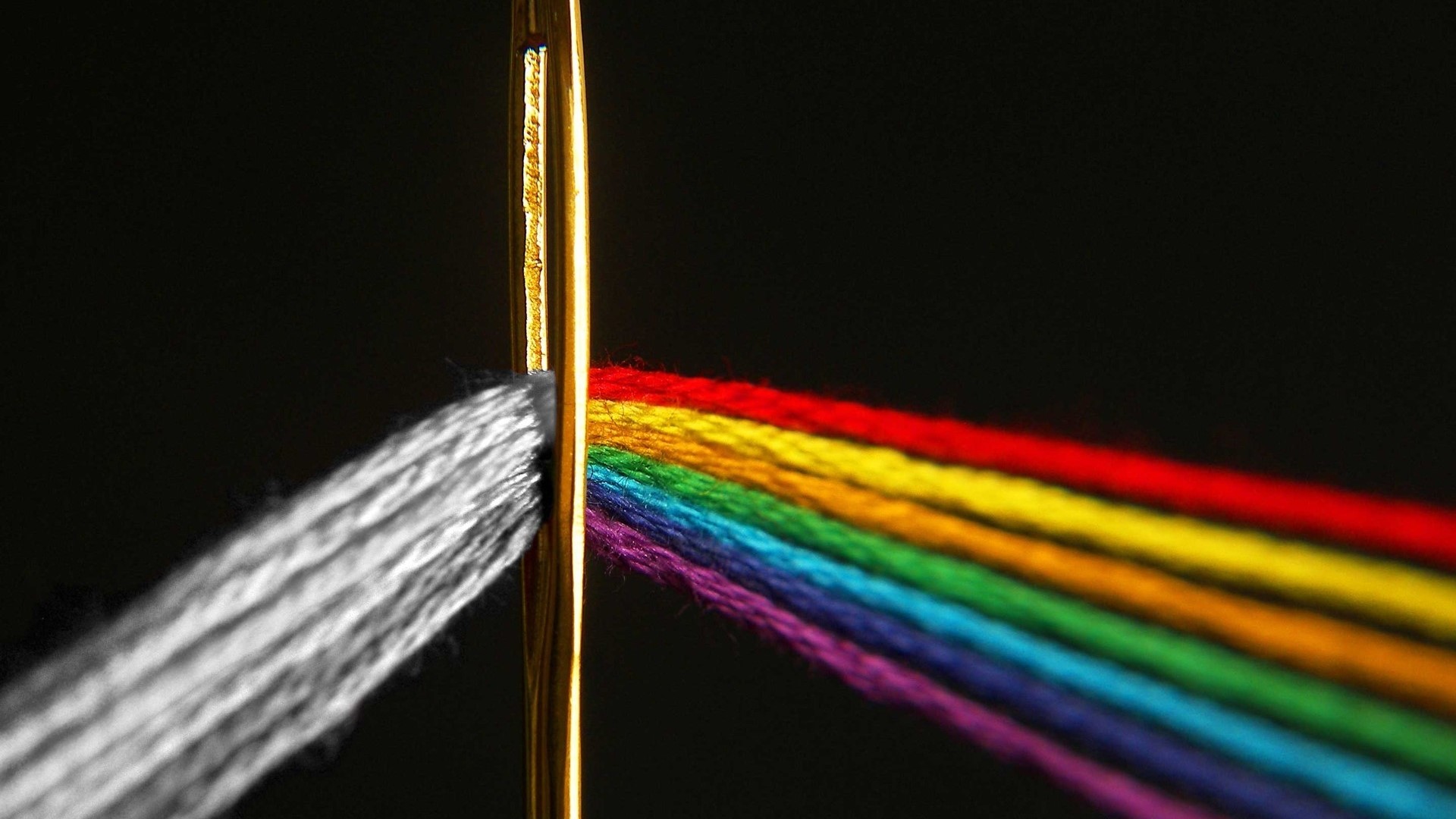 Prism effect on thread through needle HD Wallpaper