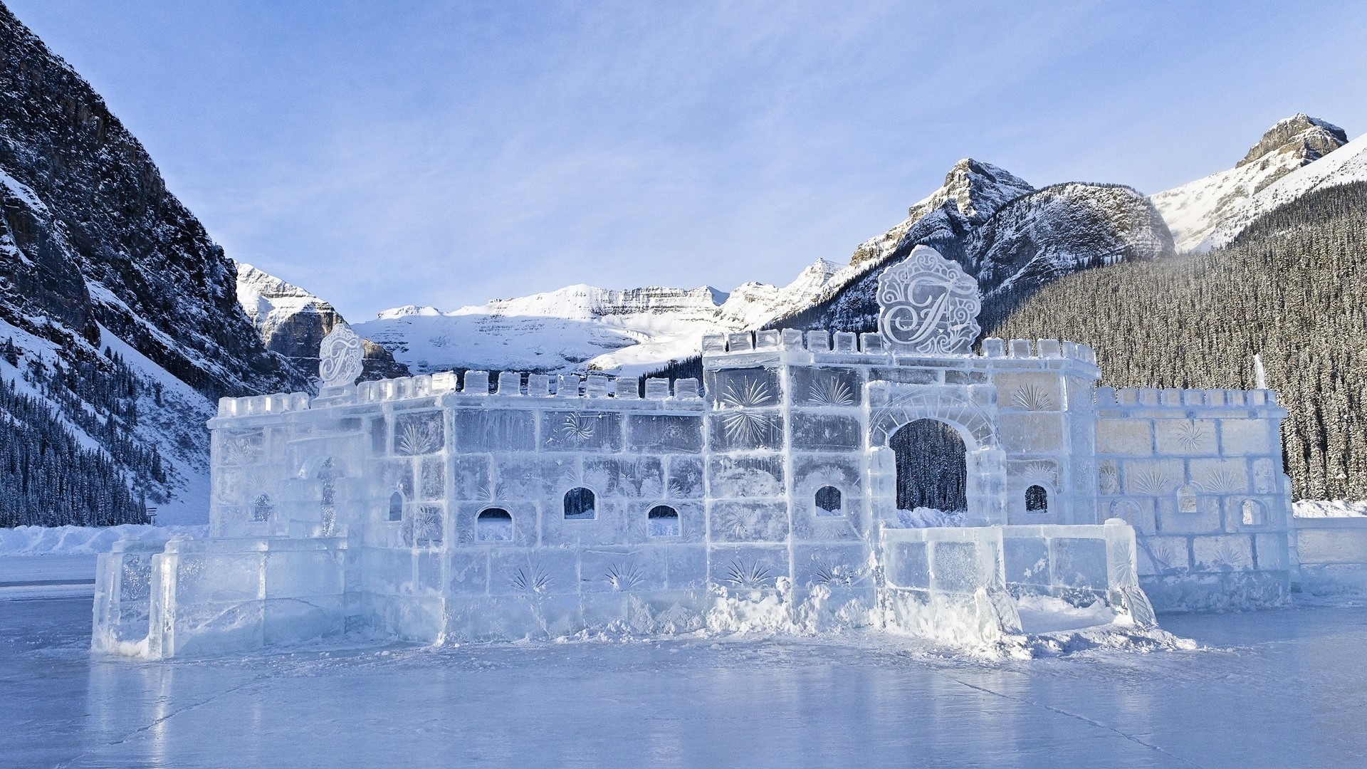 Ice castle on a frozen lake with mountains HD Wallpaper
