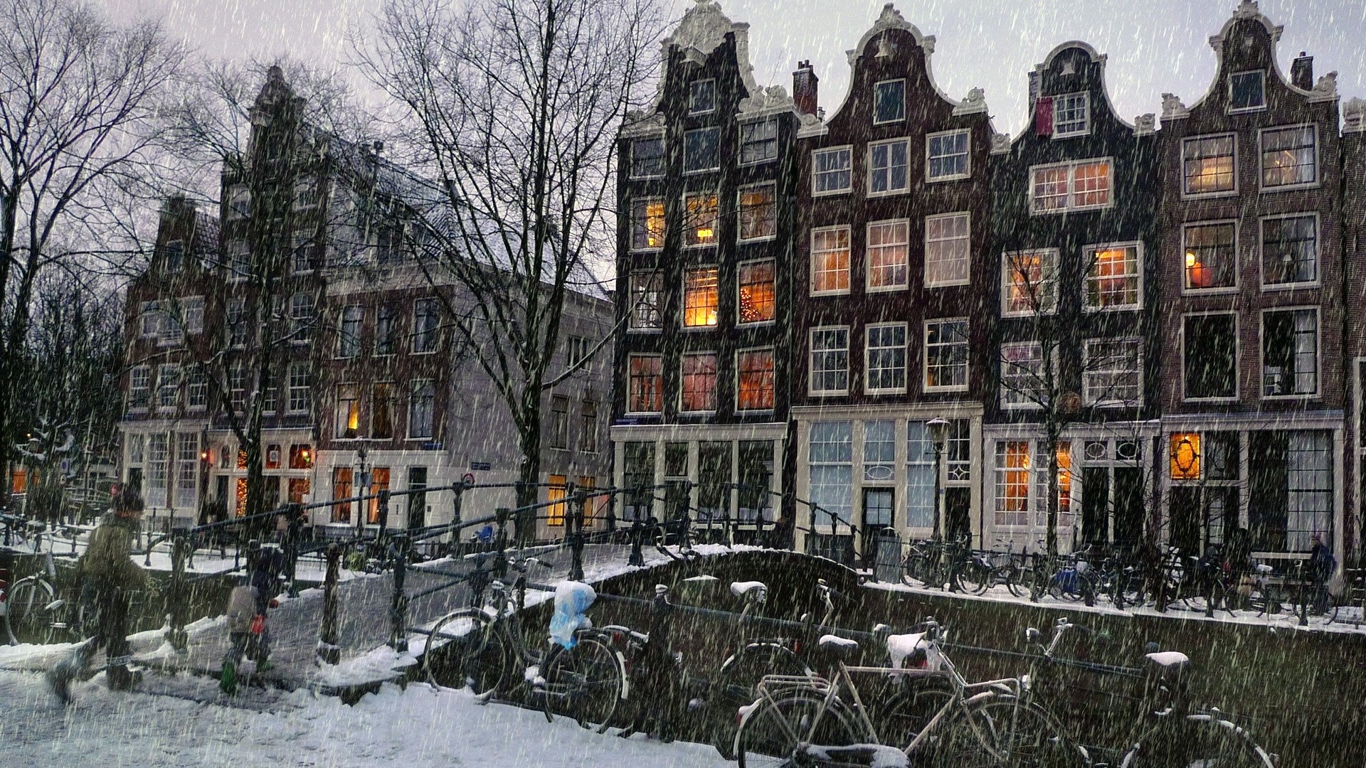 Snowy Amsterdam canal with bicycles HD Wallpaper