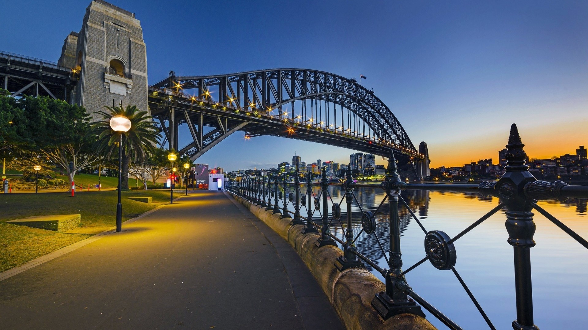 Sydney Harbour Bridge at dusk with city skyline HD Wallpaper