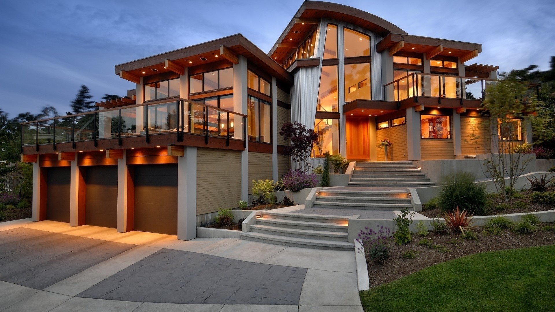 Modern luxury house with garage and large windows HD Wallpaper