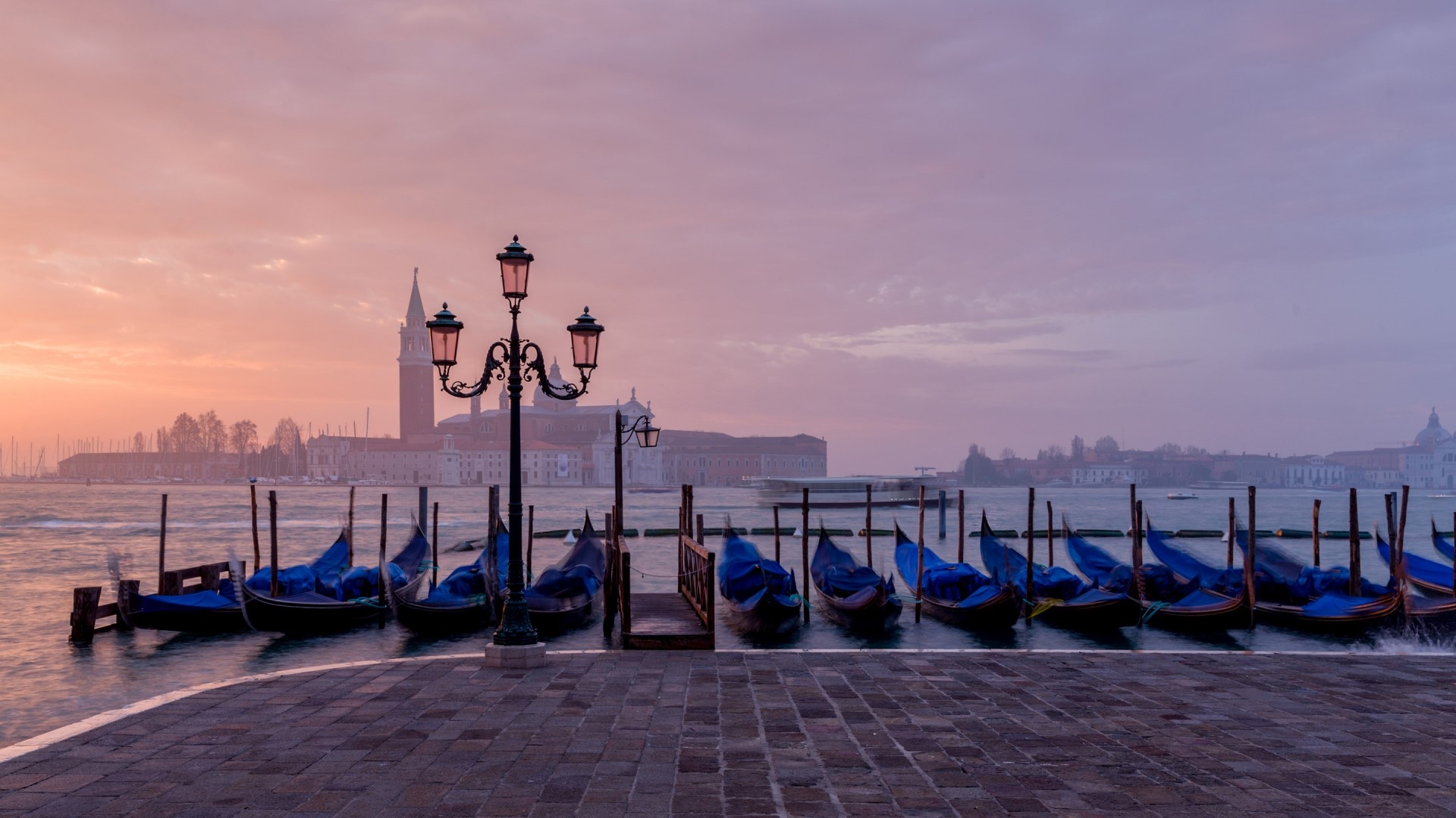 Gondolas docked in Venice at sunrise with San Giorgio Maggiore HD Wallpaper