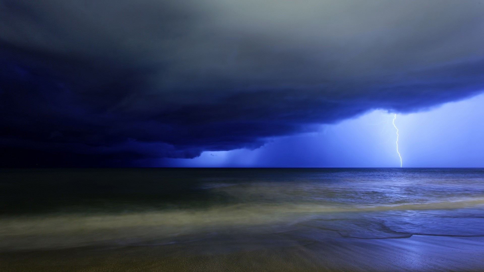 Lightning Strike over the Ocean During a Storm HD Wallpaper