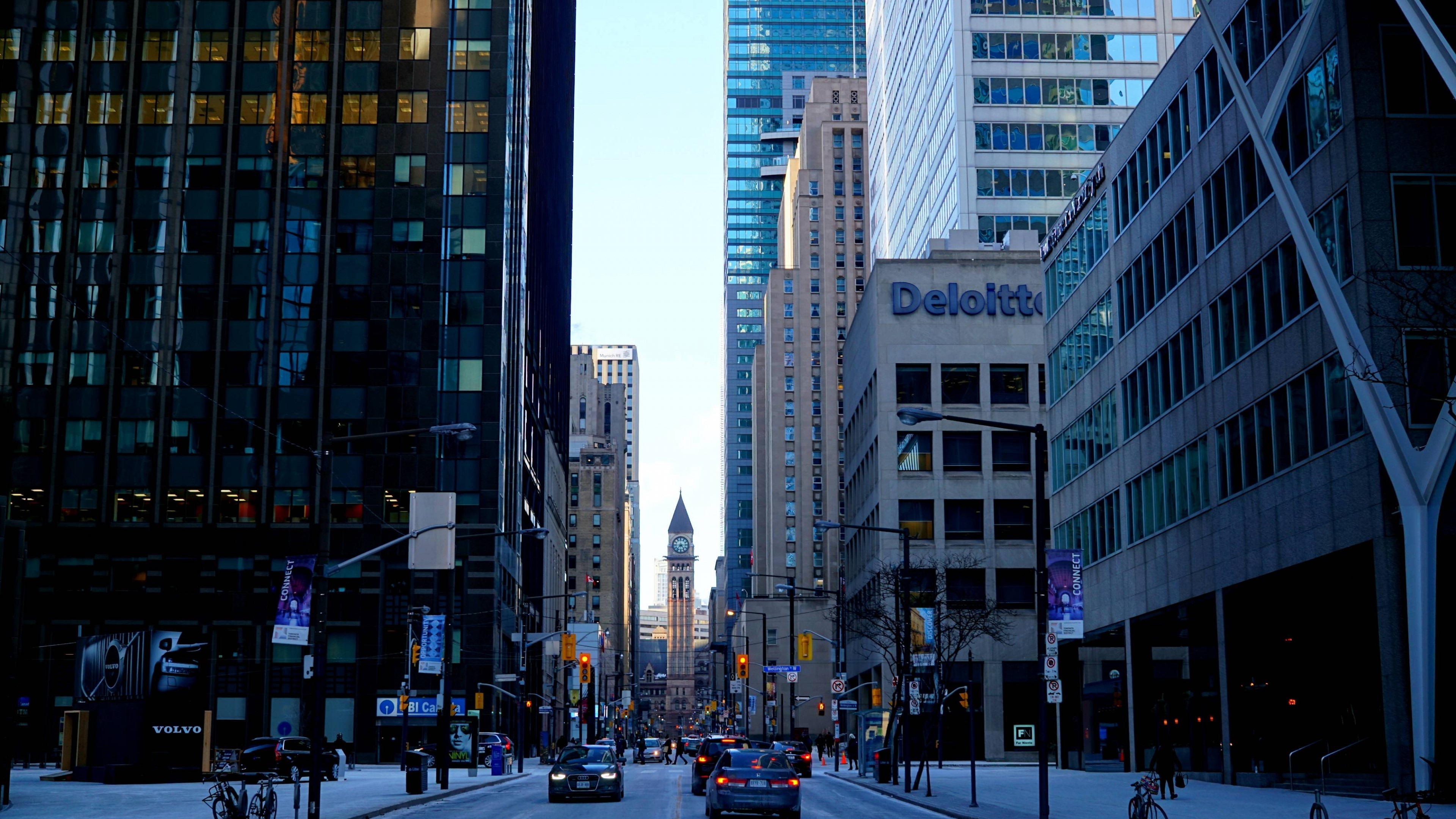 Street scene with Deloitte building and clock tower HD Wallpaper