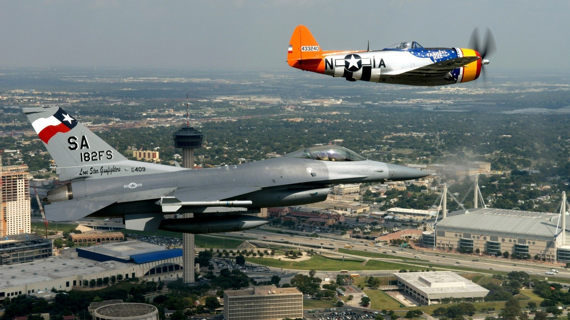 F-16 Fighting Falcon and P-47 Thunderbolt over San Antonio HD Wallpaper