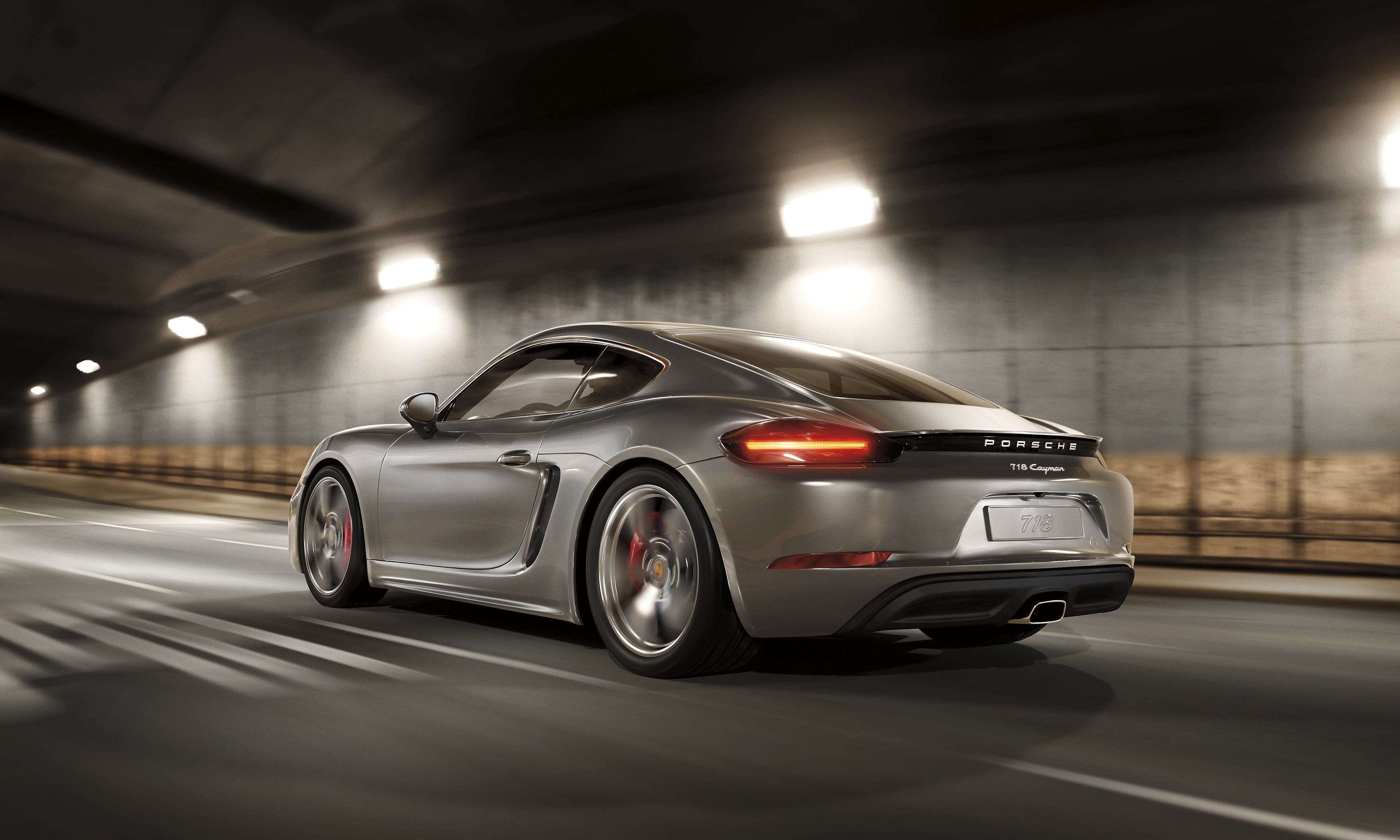 Porsche 718 Cayman driving through a tunnel 4K HD Wallpaper