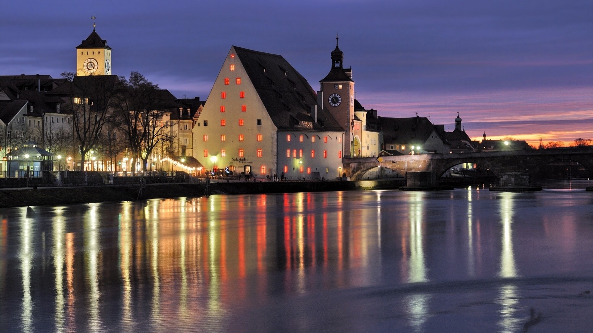 Regensburg, Germany at dusk with river reflections HD Wallpaper