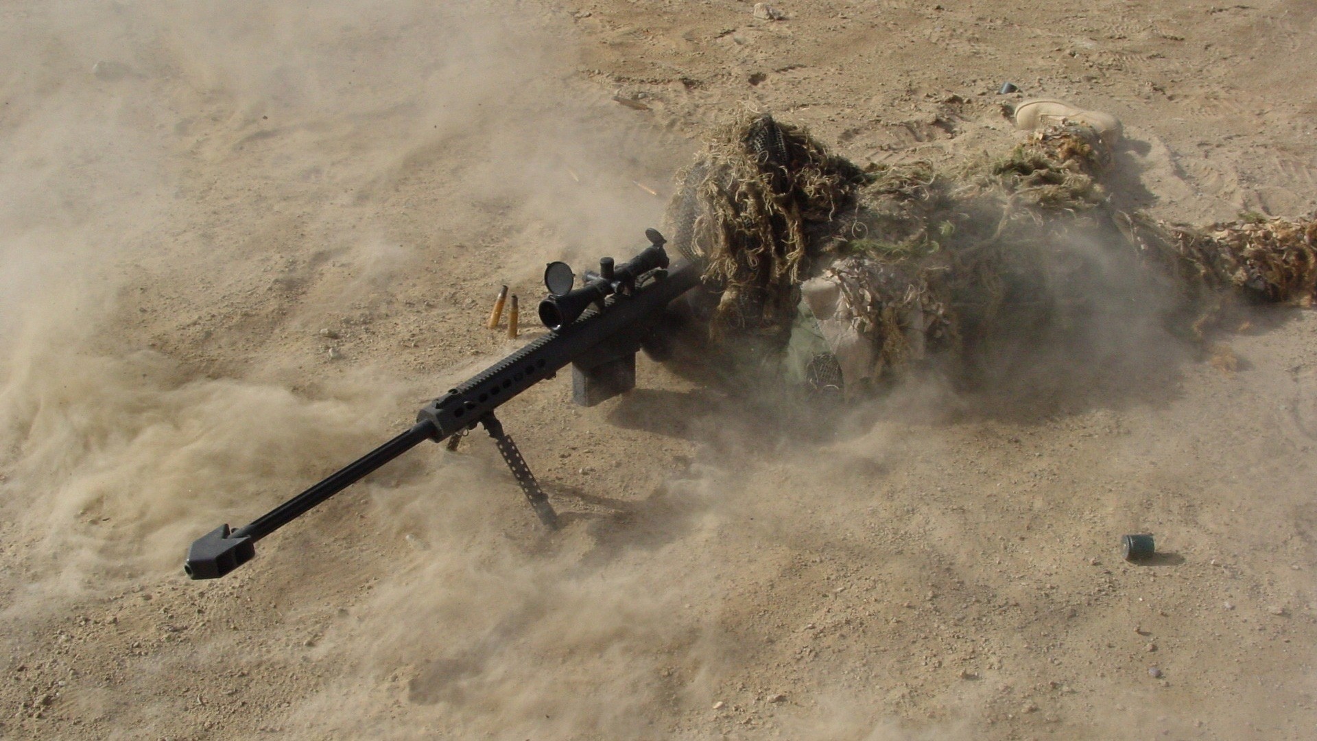 Military sniper in camouflage firing a rifle HD Wallpaper