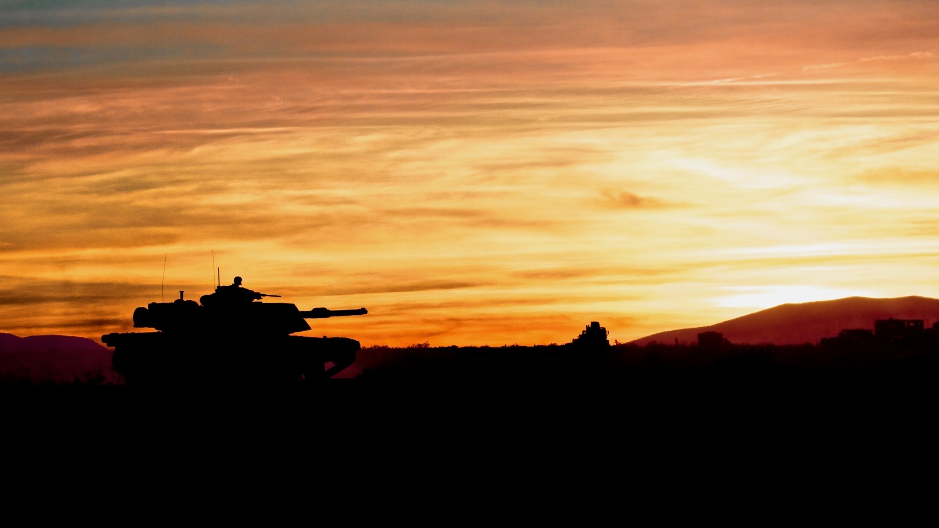 Tank silhouette against a colorful sunset sky HD Wallpaper