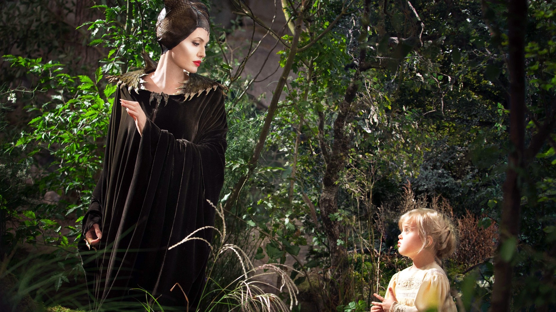 Maleficent and Aurora in a forest HD Wallpaper