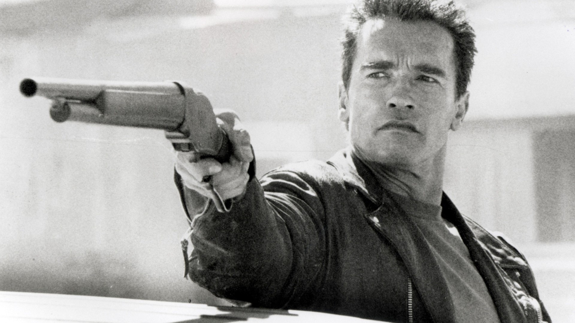 The Terminator Arnold Schwarzenegger with shotgun HD Wallpaper