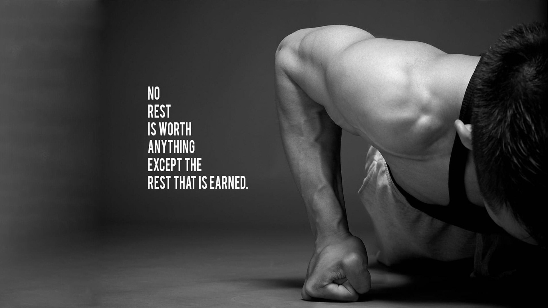 Man doing pushups with motivational quote HD Wallpaper