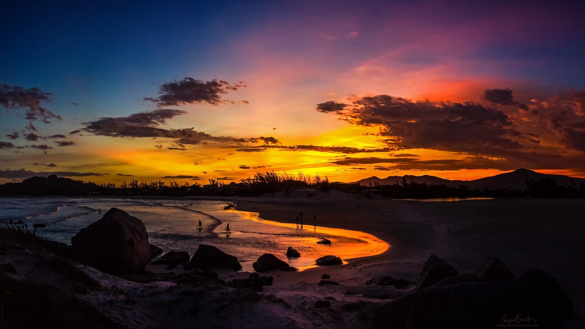 Beach sunset with colorful sky and silhouettes HD Wallpaper