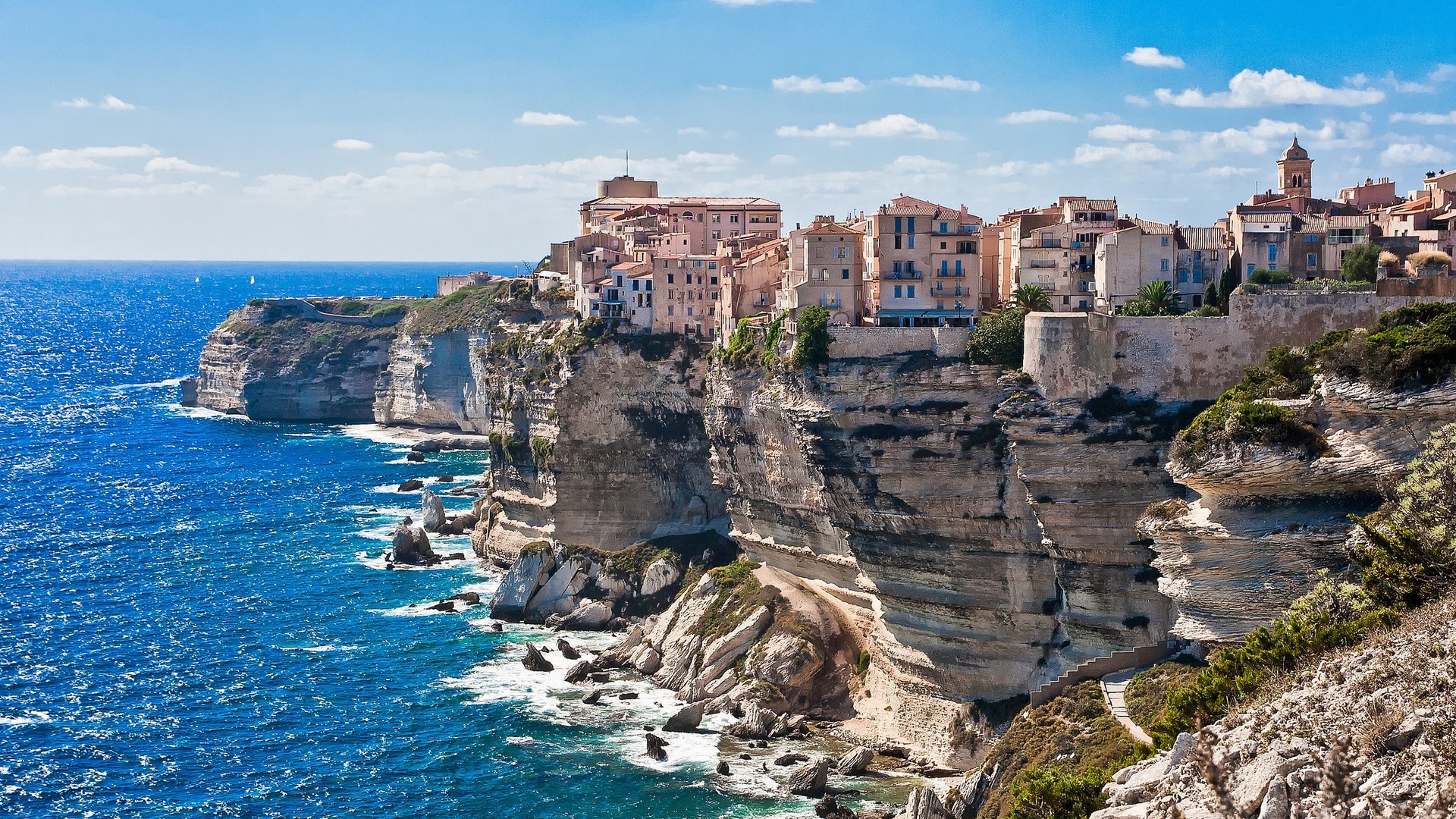 Bonifacio, Corsica coastline with buildings on cliffs HD Wallpaper