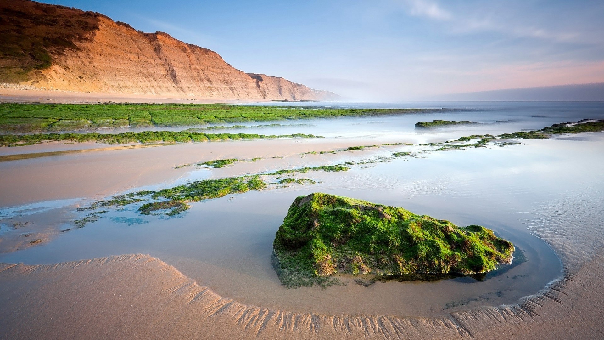 Pastel Coastline with Cliffs and Green Algae HD Wallpaper