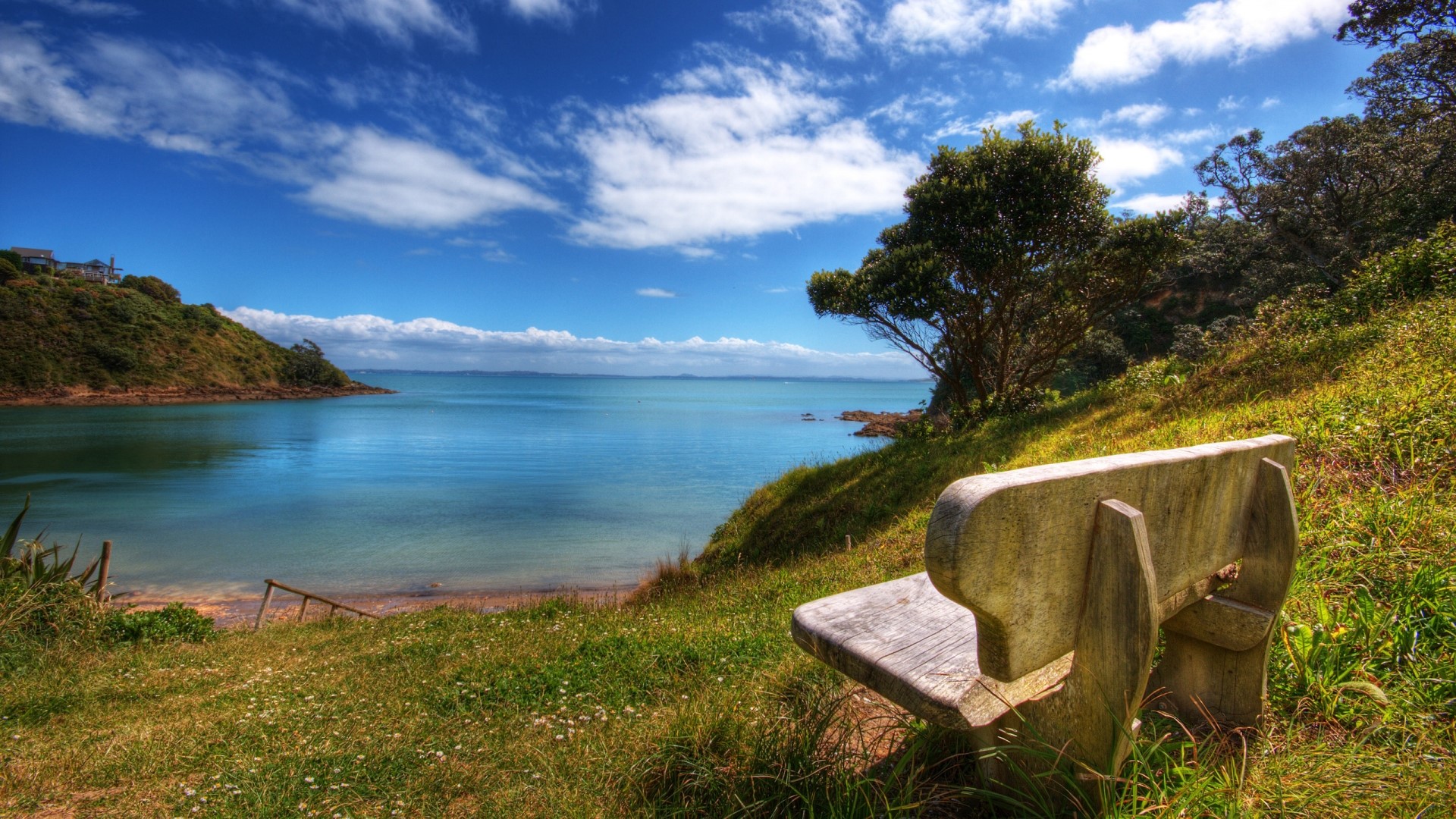 Peaceful Bay with a Bench Overlooking Water HD Wallpaper