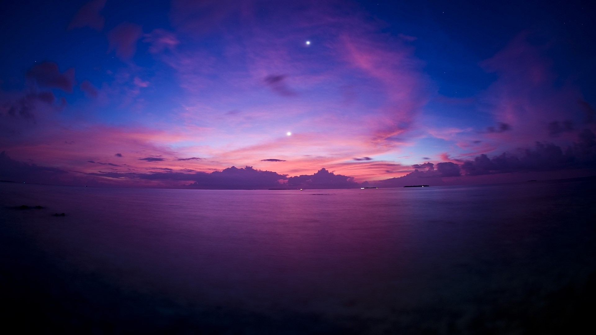 Purple Sunset Over Ocean with Two Bright Stars HD Wallpaper