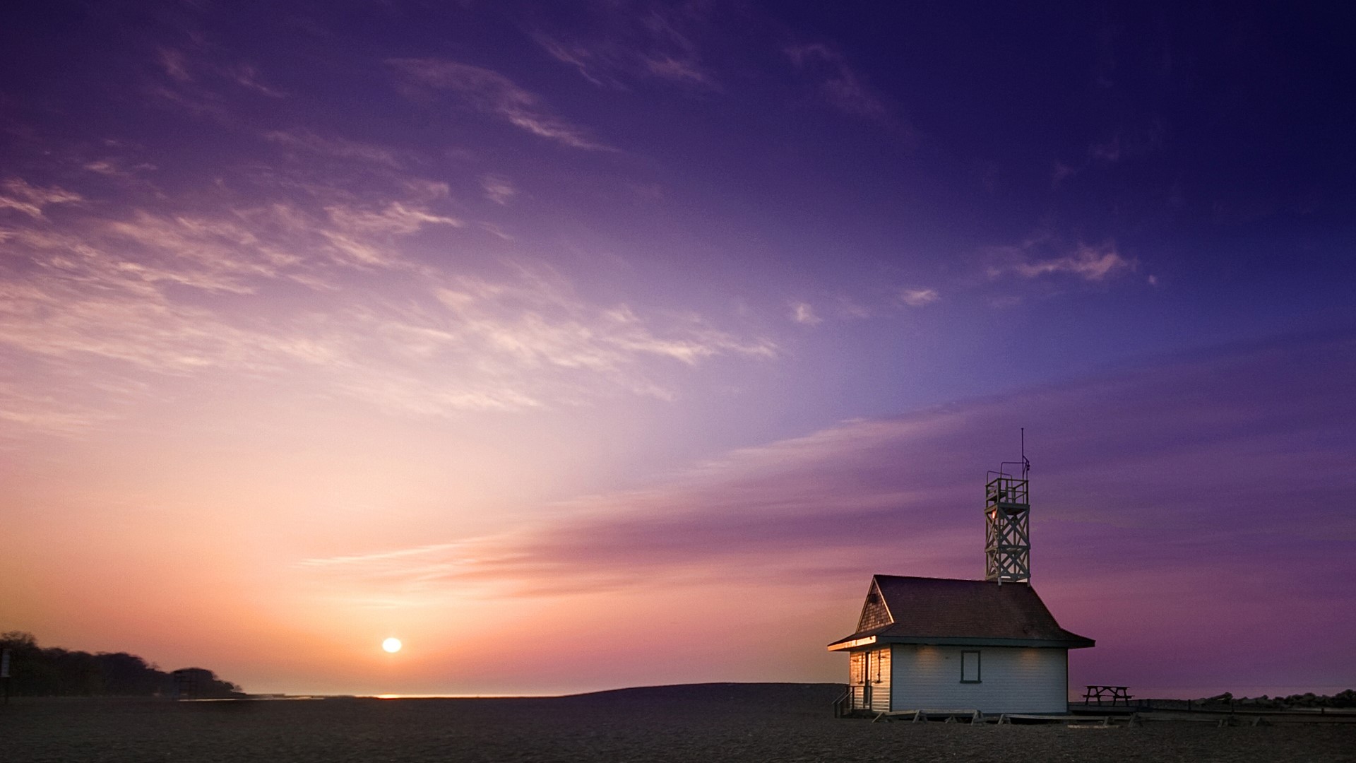 Beach house with tower at sunset HD Wallpaper