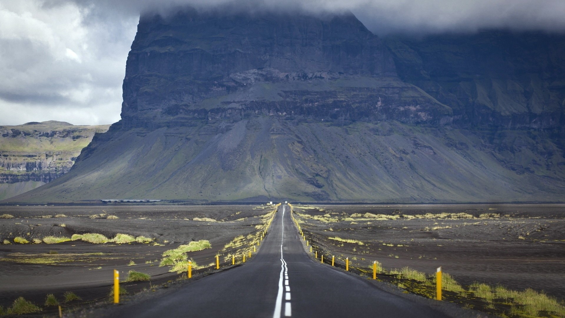 Road leading to a large mountain in Iceland HD Wallpaper