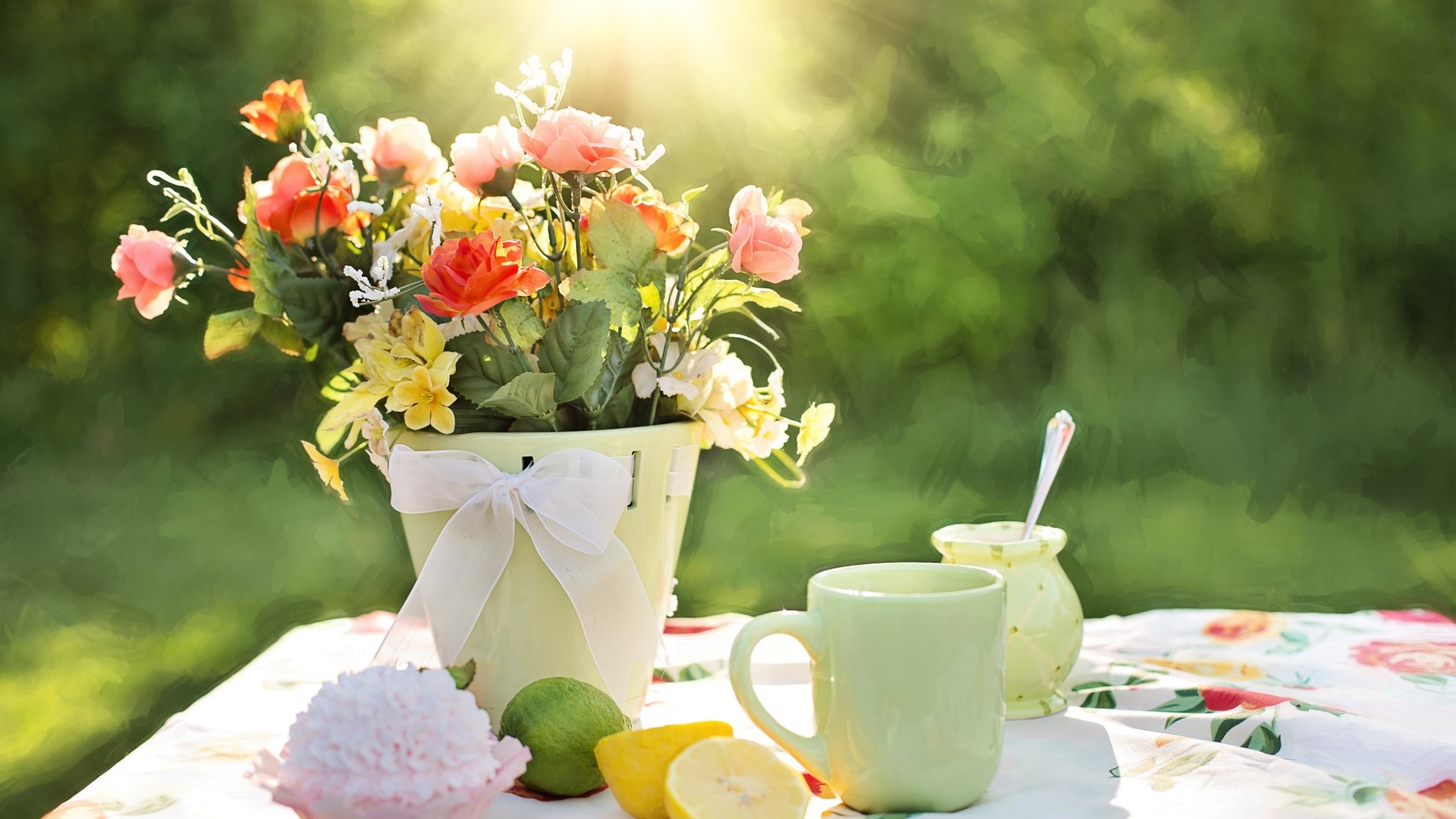 Summer flowers in a pot with tea set on a table HD Wallpaper