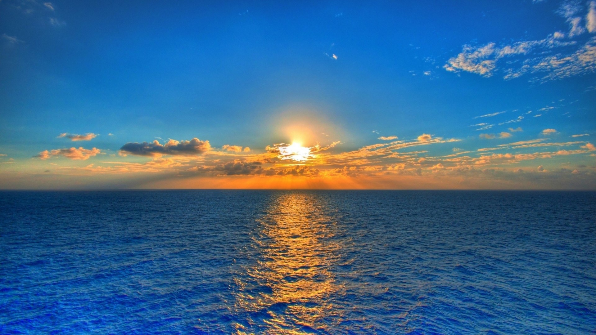 Deep Blue Ocean Sunset with Clouds HD Wallpaper