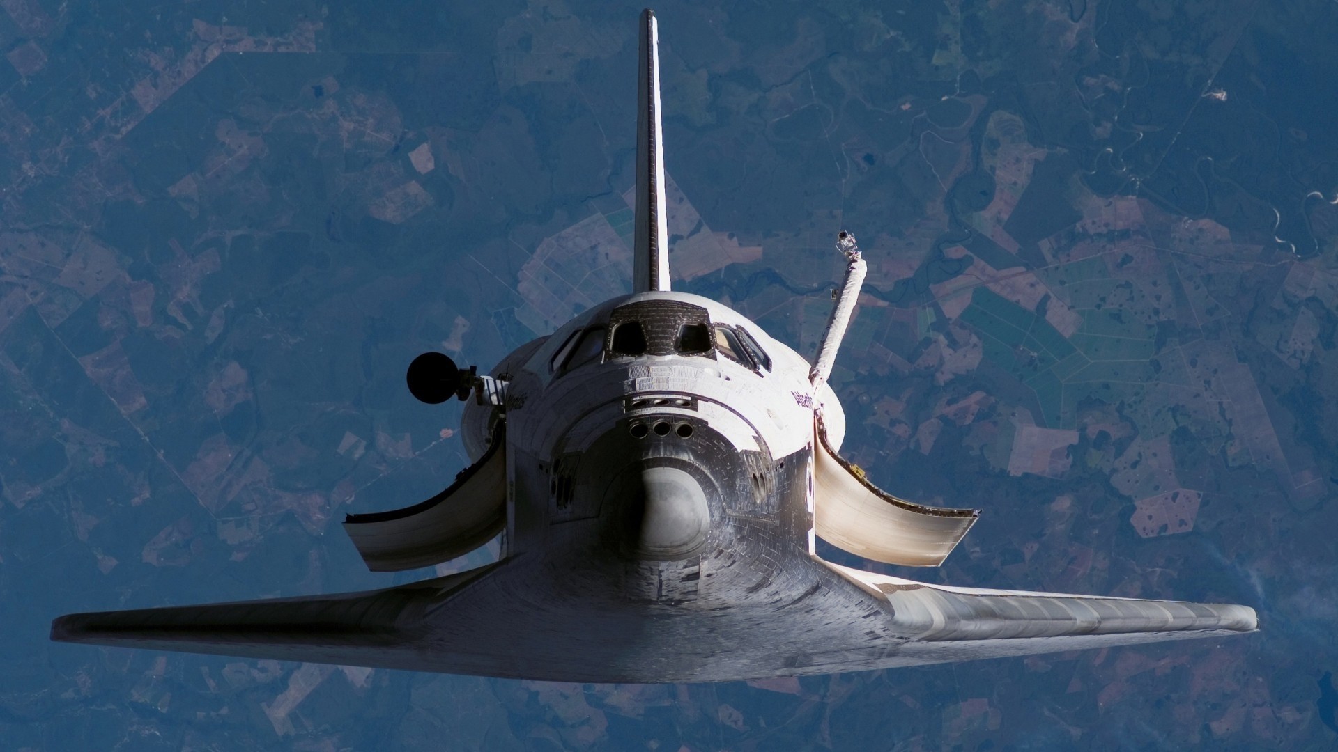 Space Shuttle orbiting Earth HD Wallpaper