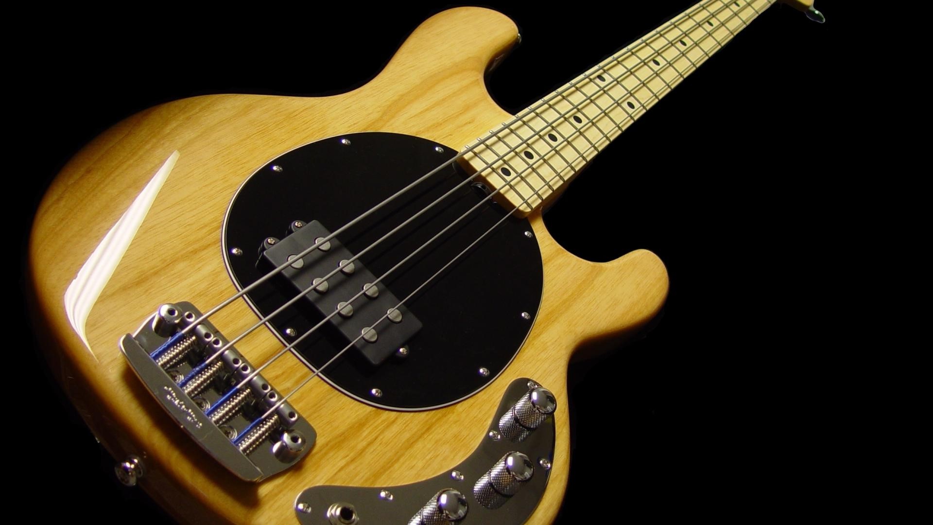 Natural wood 4-string bass guitar HD Wallpaper