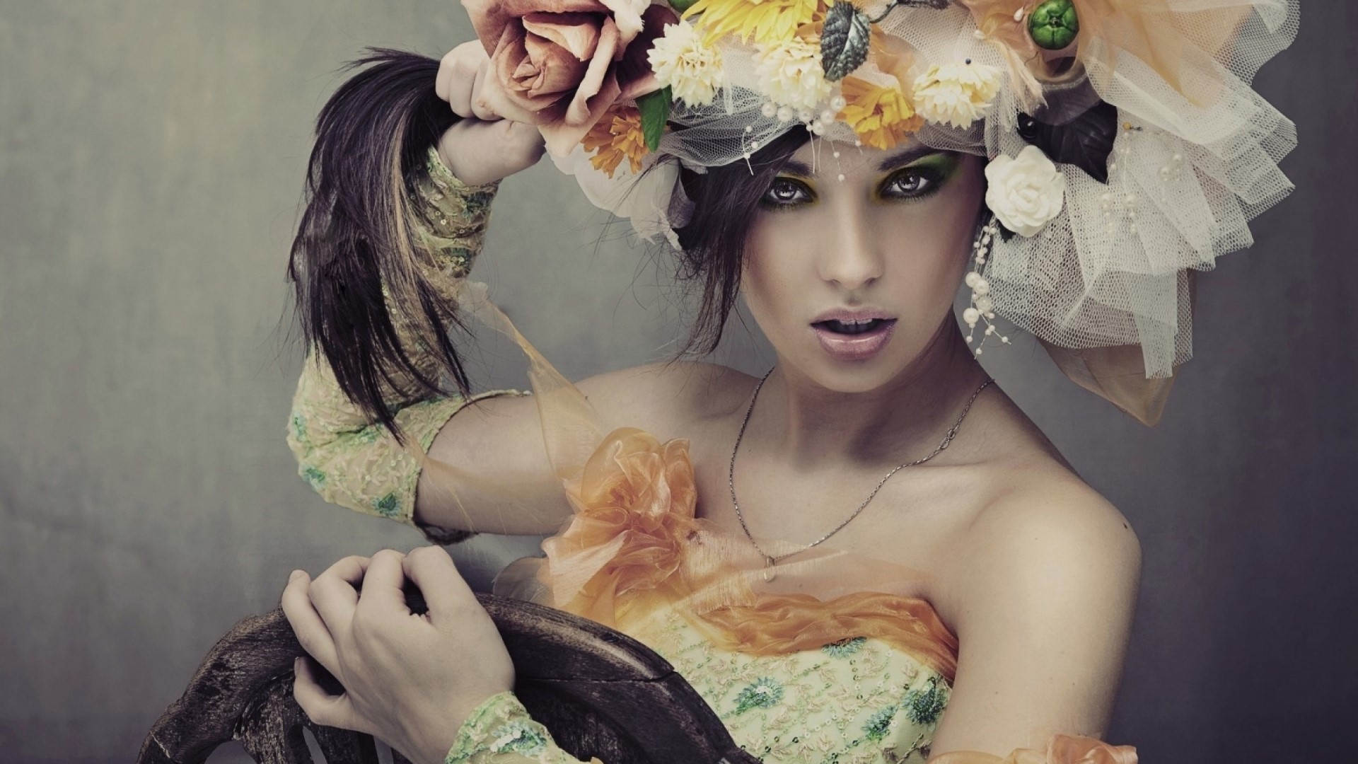 Woman with elaborate floral headdress and green dress HD Wallpaper