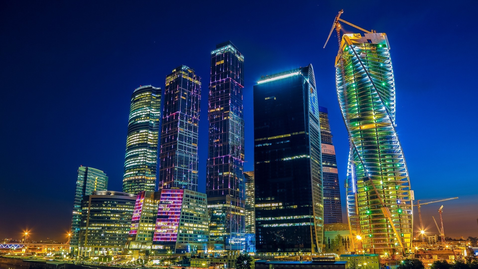 Night Cityscape with Colorful Illuminated Skyscrapers HD Wallpaper
