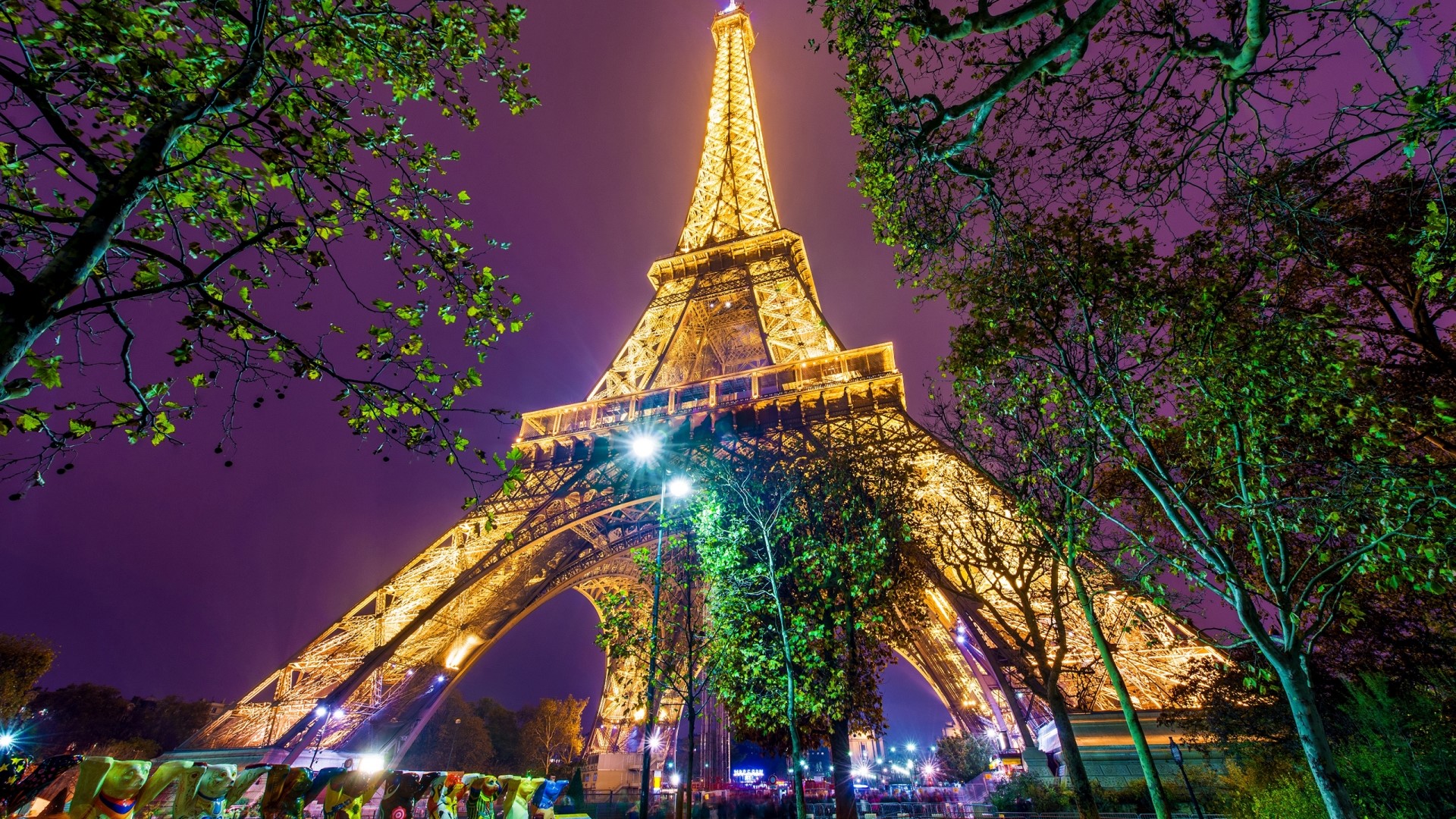 Eiffel Tower illuminated at night HD Wallpaper