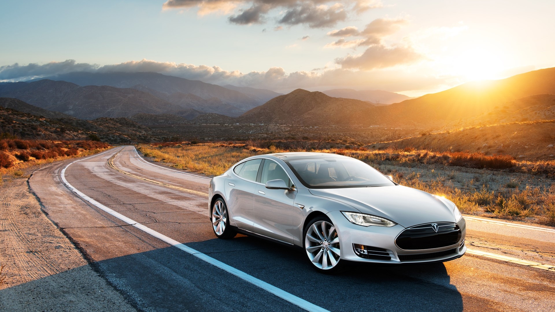 Silver Tesla on a Desert Road at Sunset HD Wallpaper
