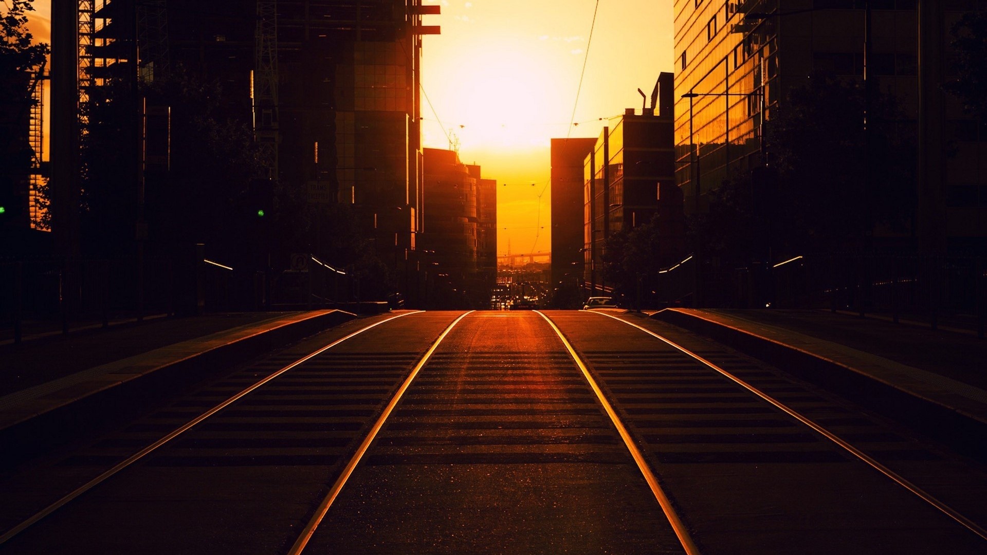 City Street with Tram Tracks at Sunrise HD Wallpaper