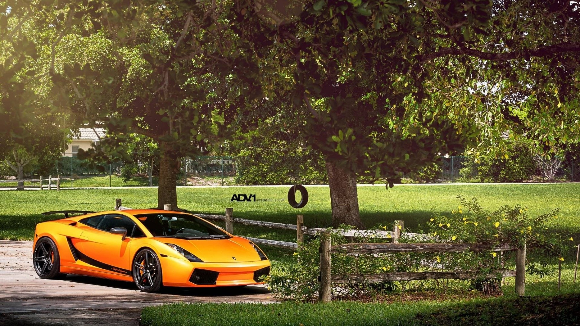 Orange Lamborghini Gallardo parked on driveway HD Wallpaper