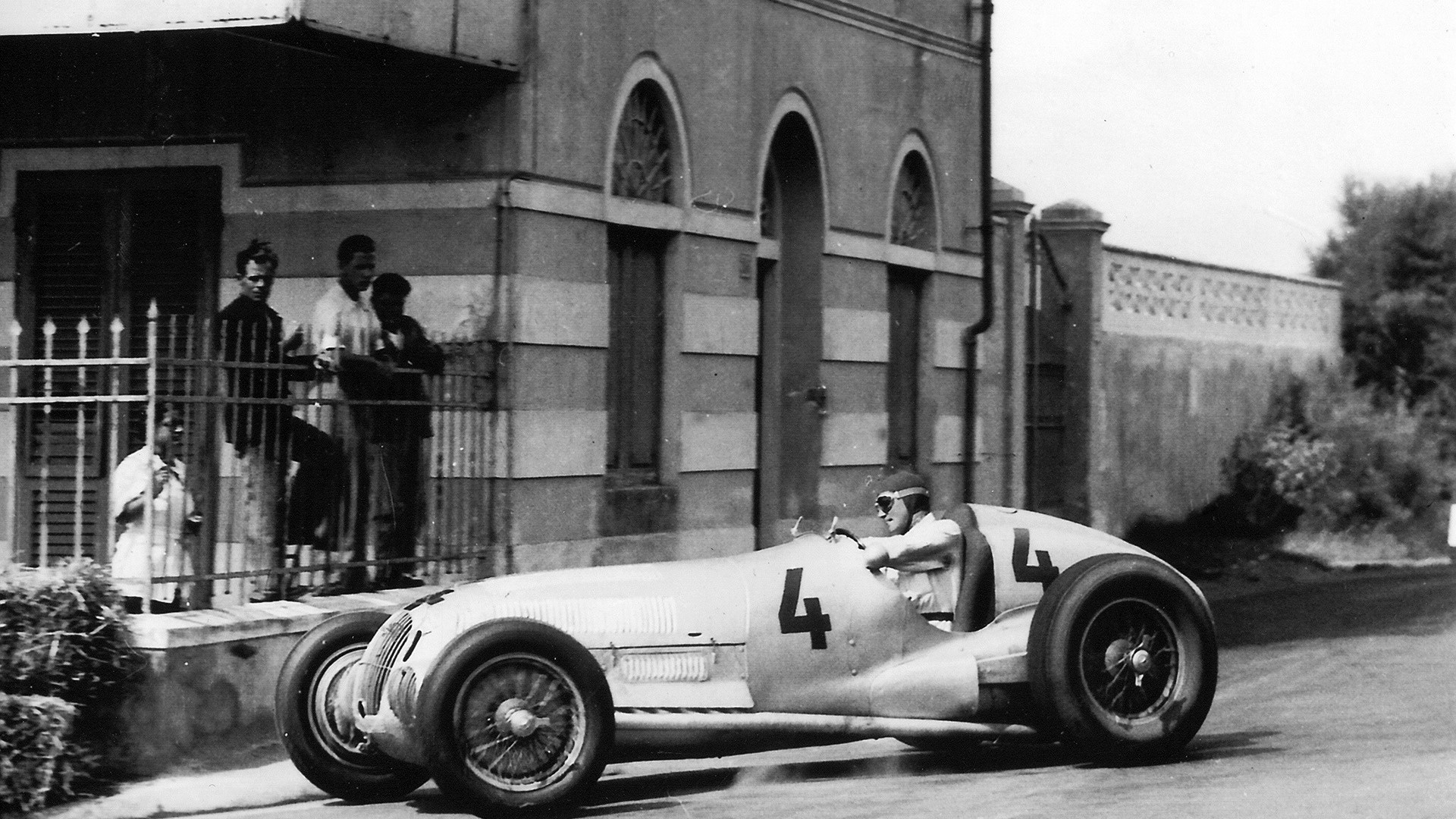 Vintage race car with number 4 on track HD Wallpaper
