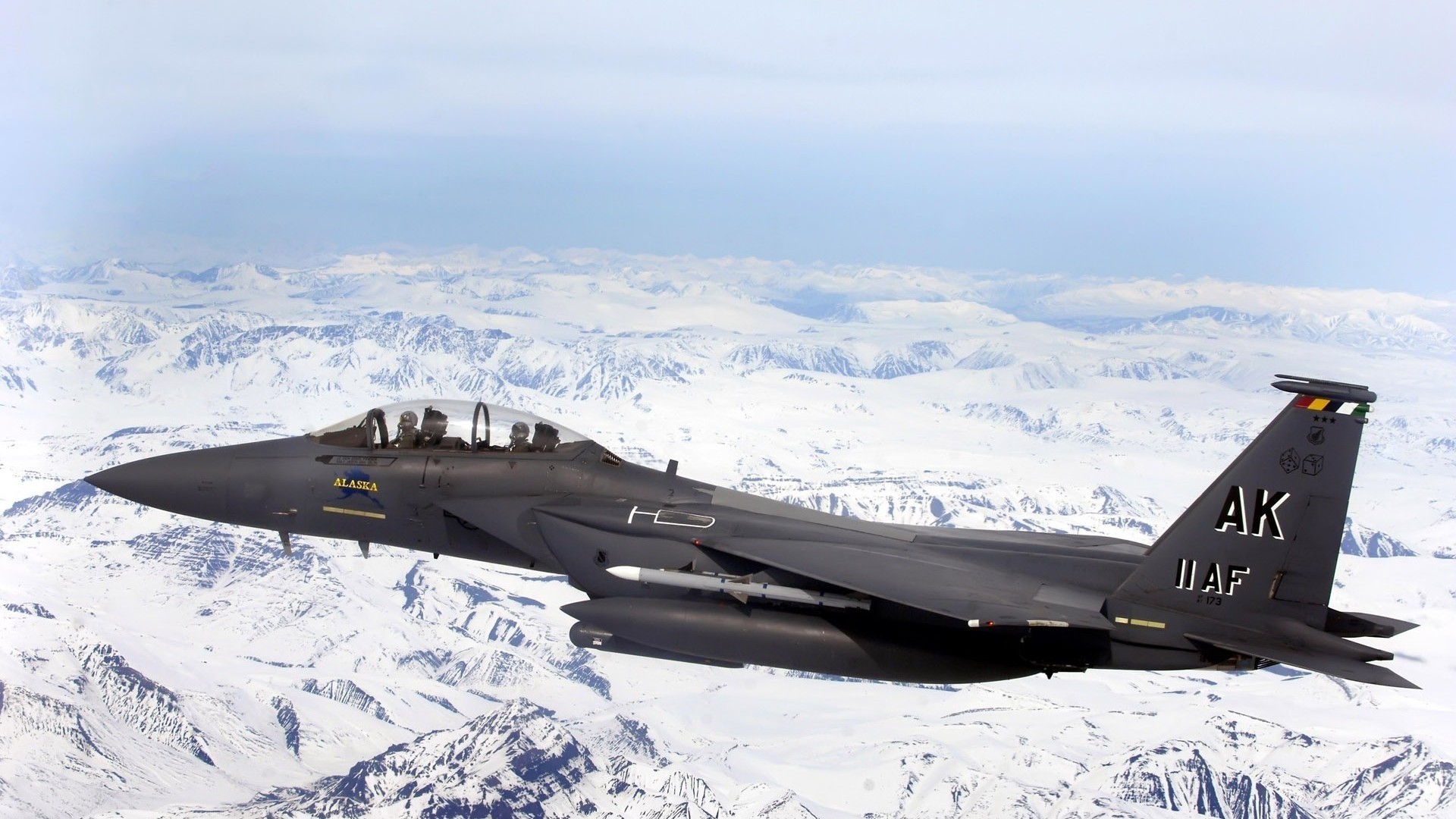 F-15 Fighter Jet Flying Over Snowy Mountains HD Wallpaper